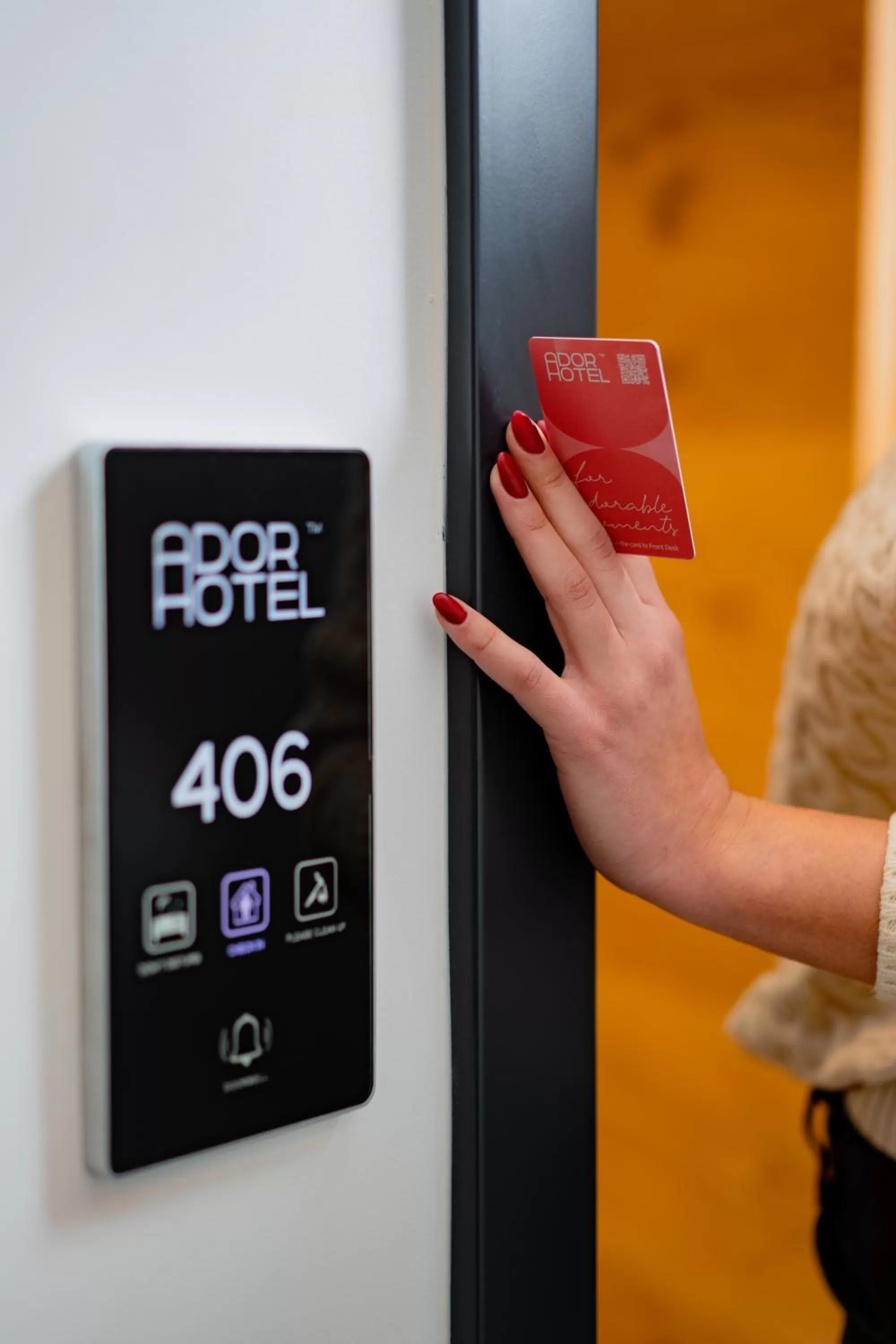 Property logo or sign in Ador Hotel