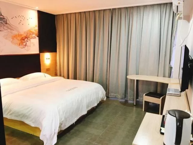 Bed in Shenzhen Hualian Boutique Hotel