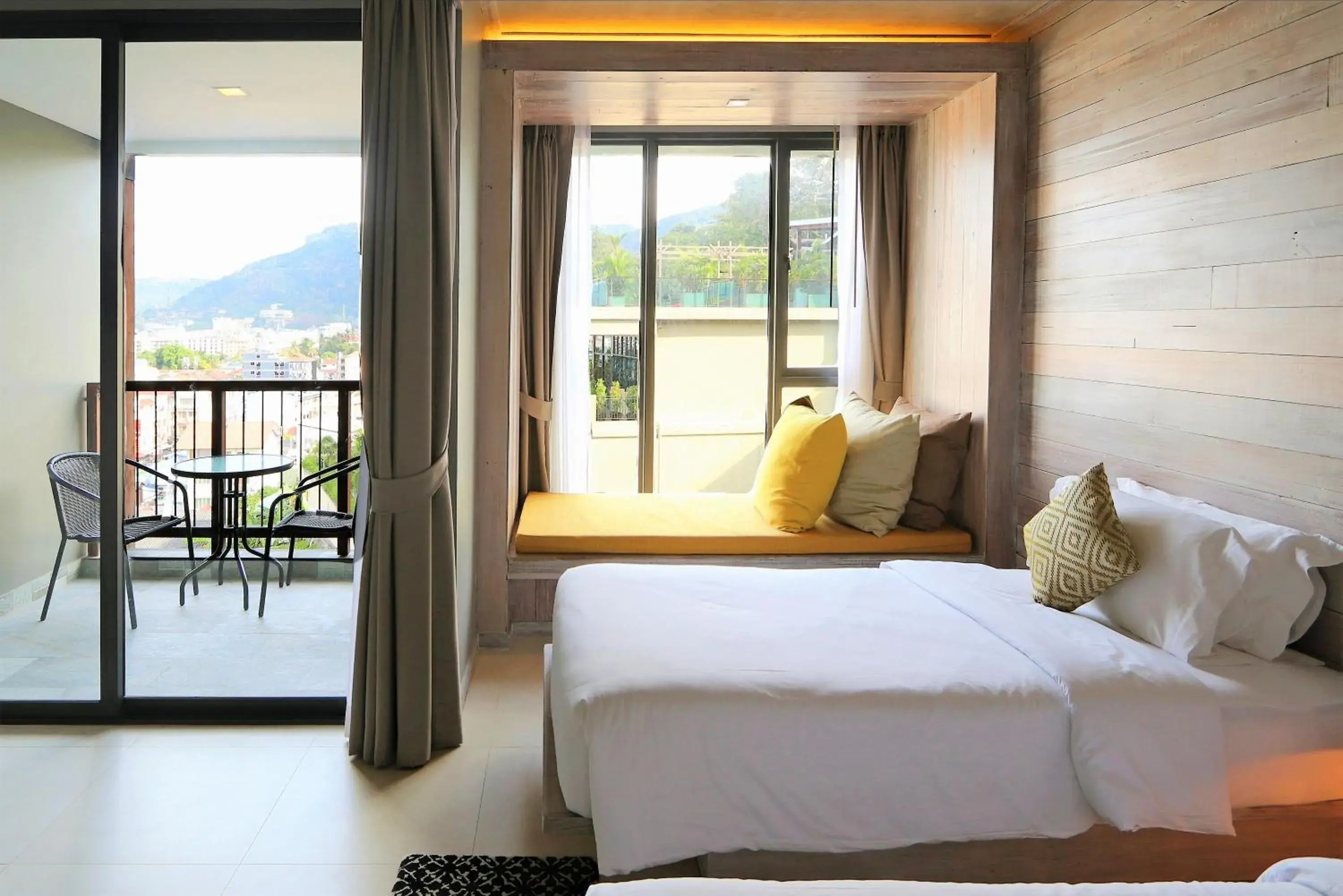 Bed in Dinso Resort & Villas Phuket an IHG Hotel