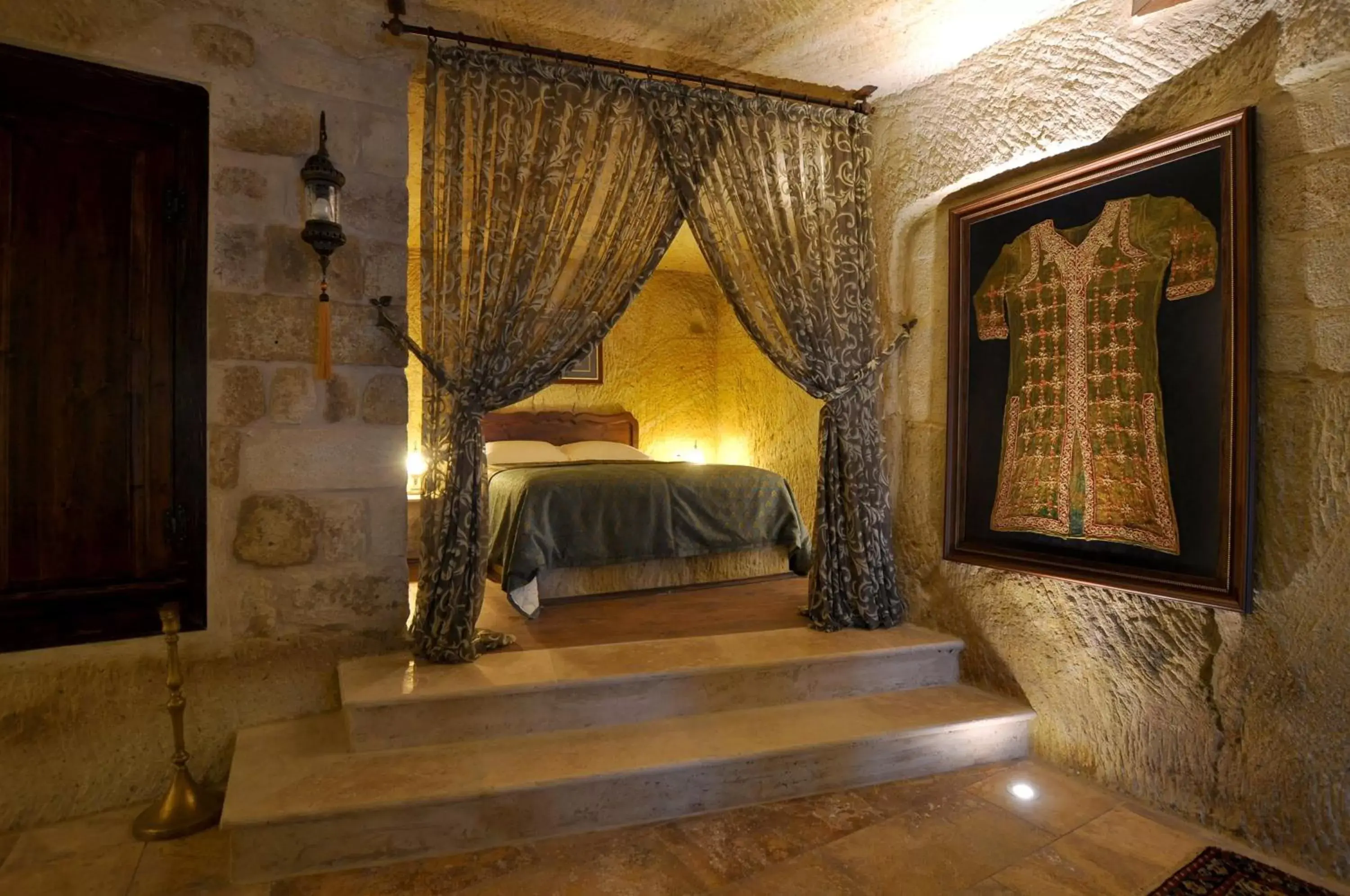 Bed in Kayakapi Premium Caves Cappadocia
