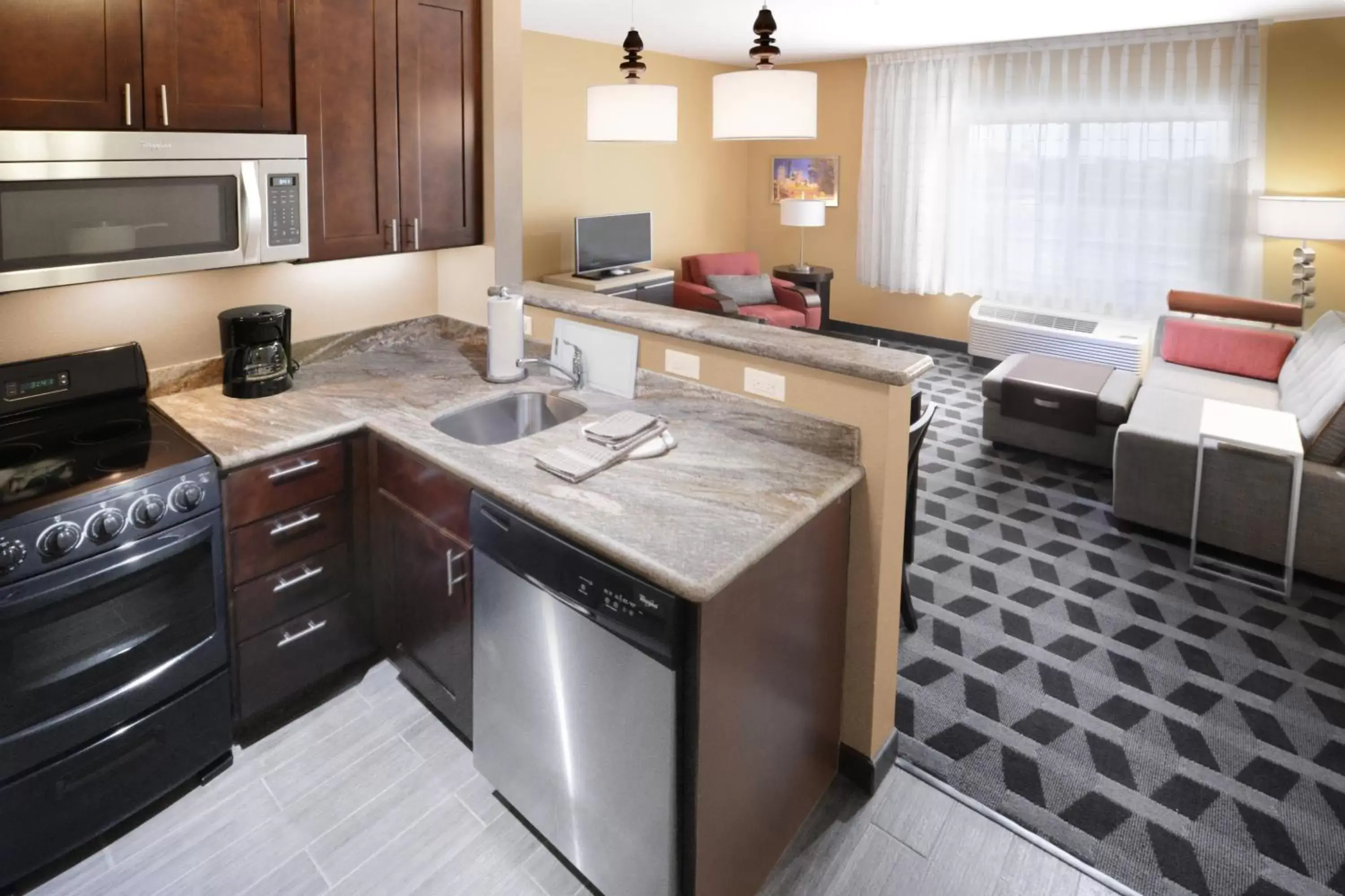 Living room, Kitchen/Kitchenette in TownePlace Suites by Marriott Houston Westchase