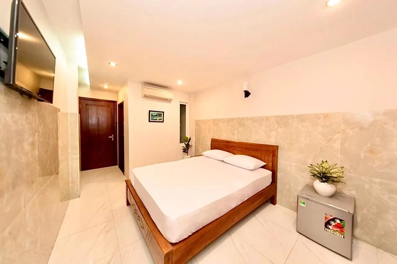 Bed in SaiGon CoZy Hotel "241 Pham Ngu Lao Street''