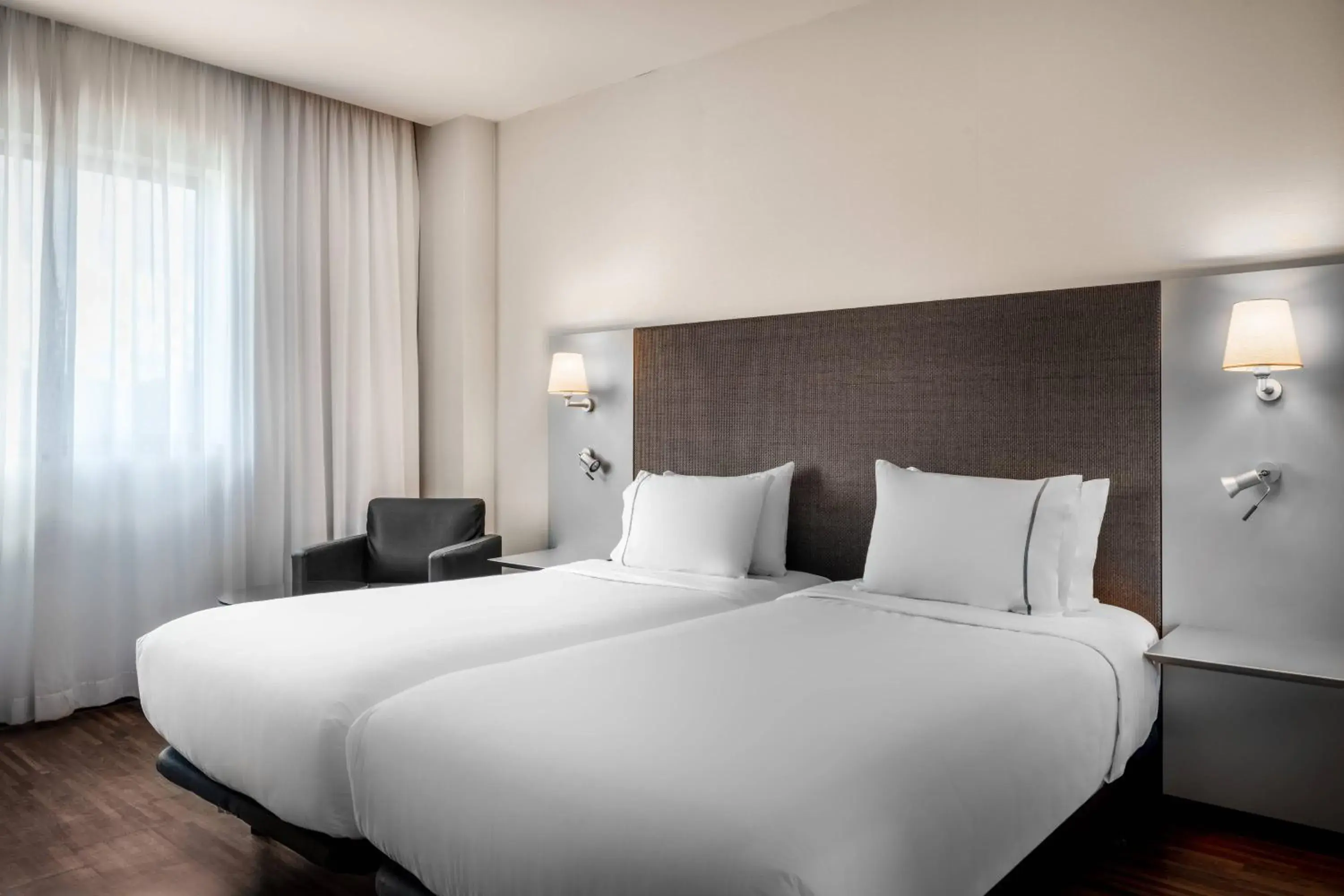 Photo of the whole room, Bed in AC Hotel Gijón by Marriott