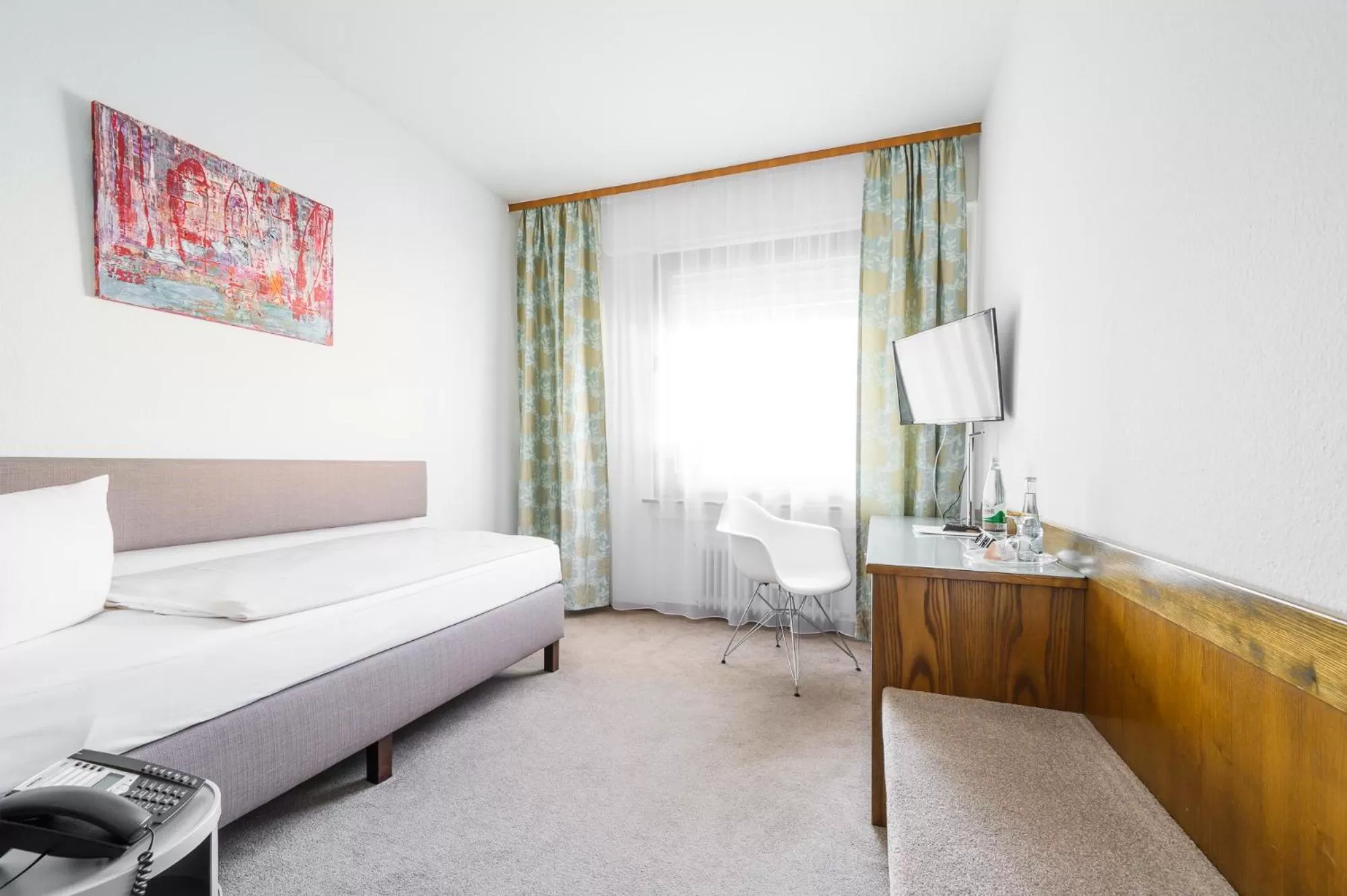 Bed in Hotel Kaspar Garni