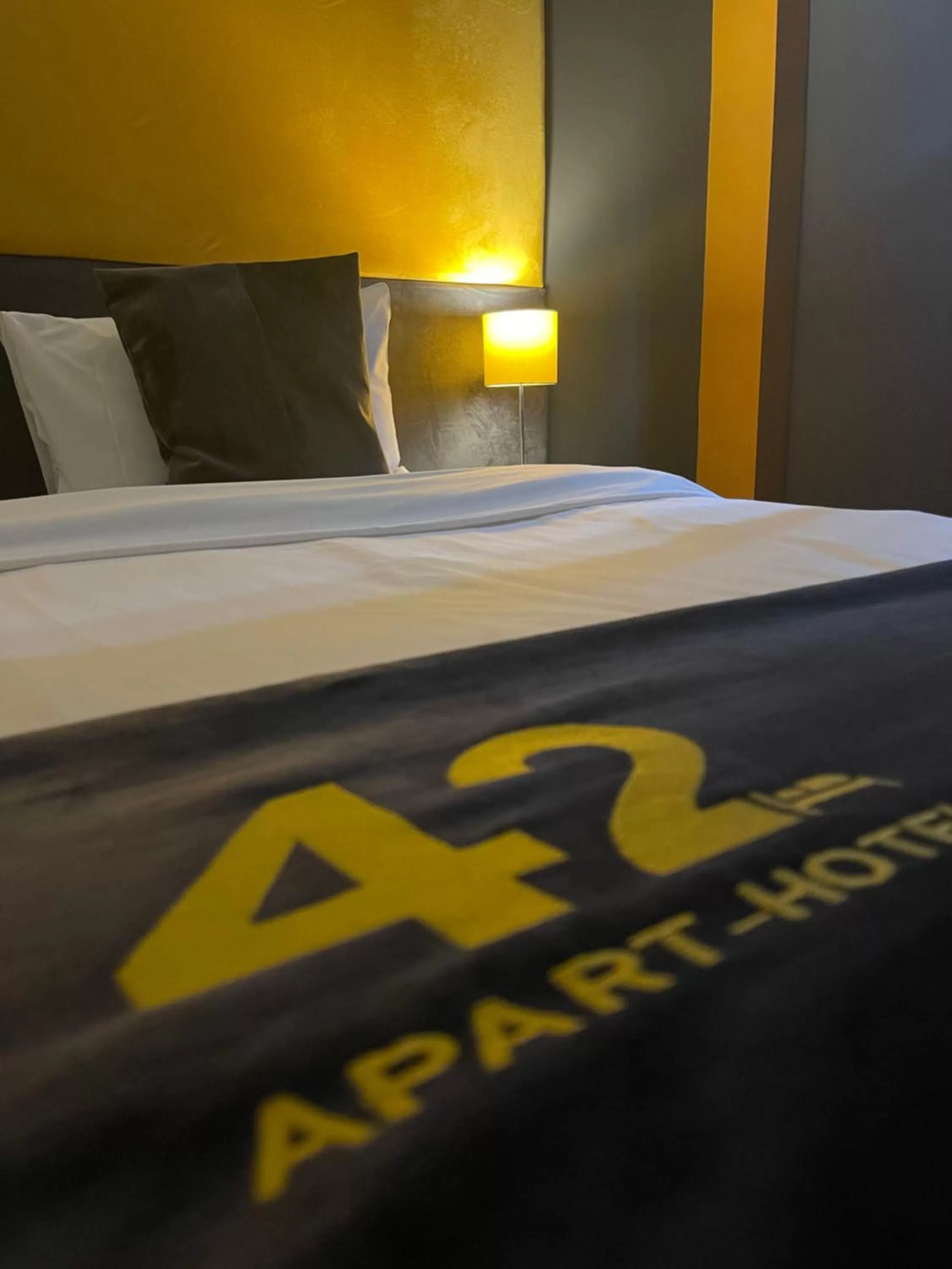 Bed in 42 Apart-Hotel