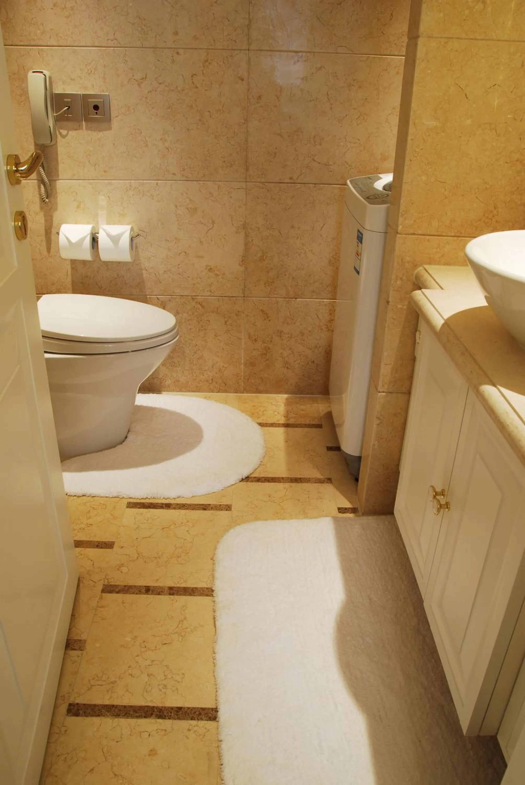 Bathroom in Wealthy All Suite Hotel Suzhou