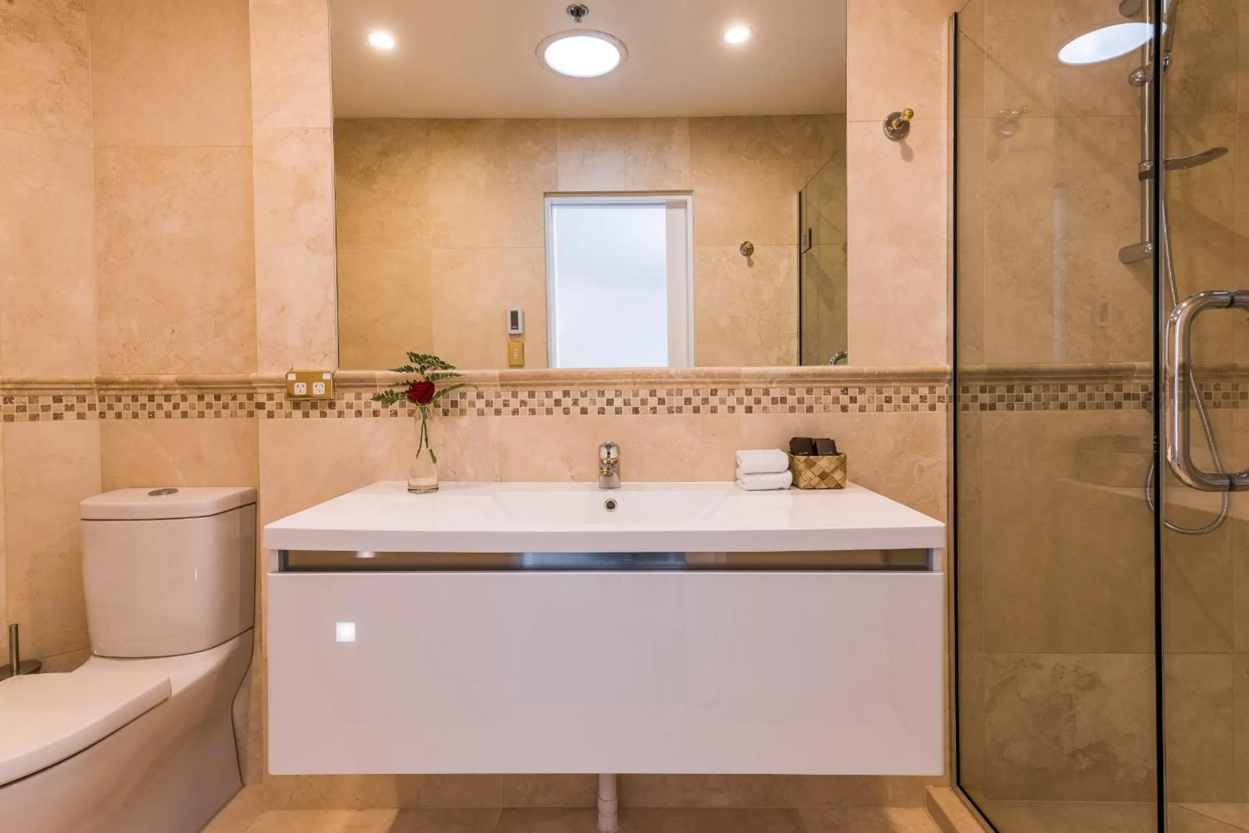 Bathroom in Fino Hotel & Suites