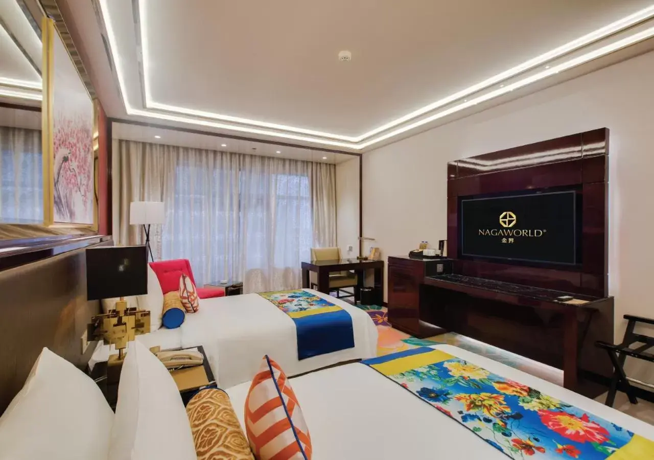 Bed, TV/Entertainment Center in NagaWorld Hotel & Entertainment Complex