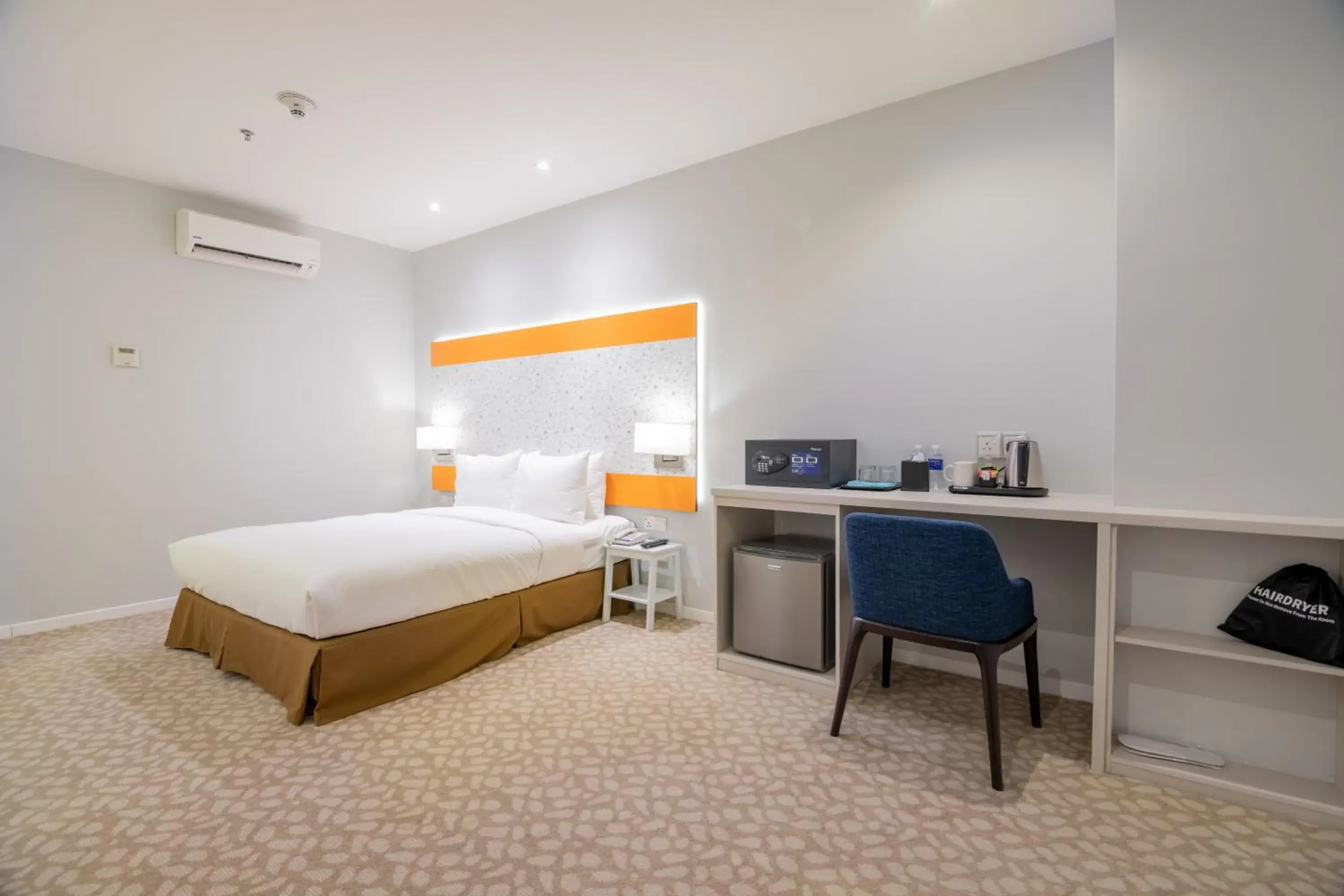 Bed in Holiday Inn Express & Suites Johor Bahru, an IHG Hotel