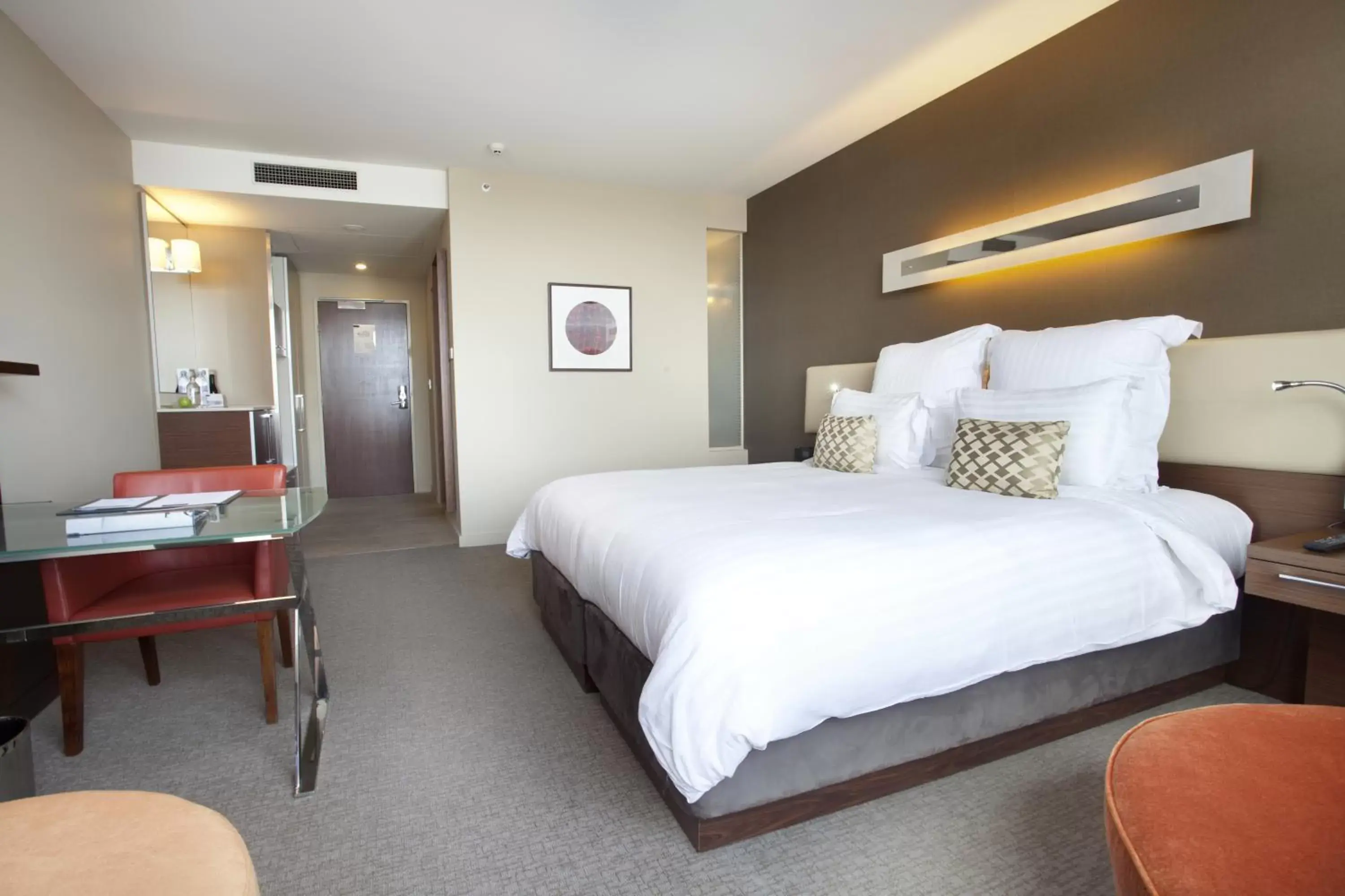 Bed in Pullman at Sydney Olympic Park Hotel