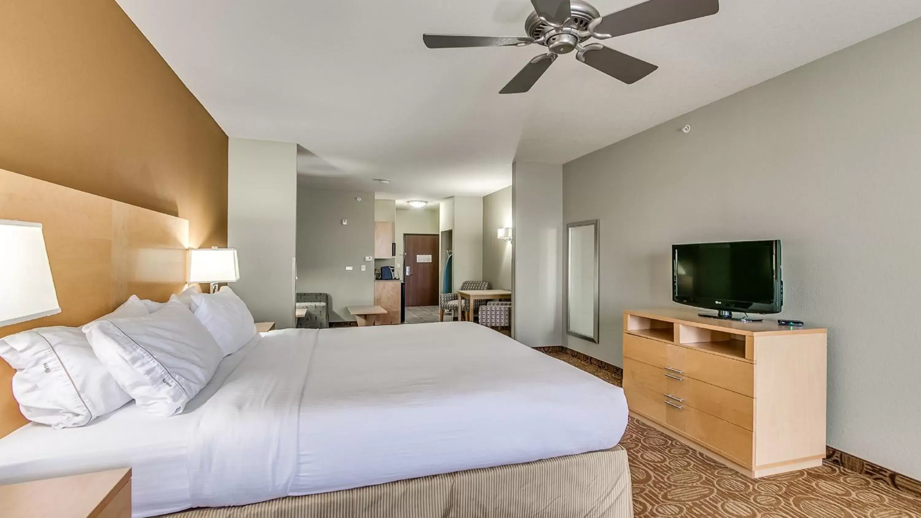 Photo of the whole room, TV/Entertainment Center in Holiday Inn Express & Suites Lubbock Southwest – Wolfforth, an IHG Hotel