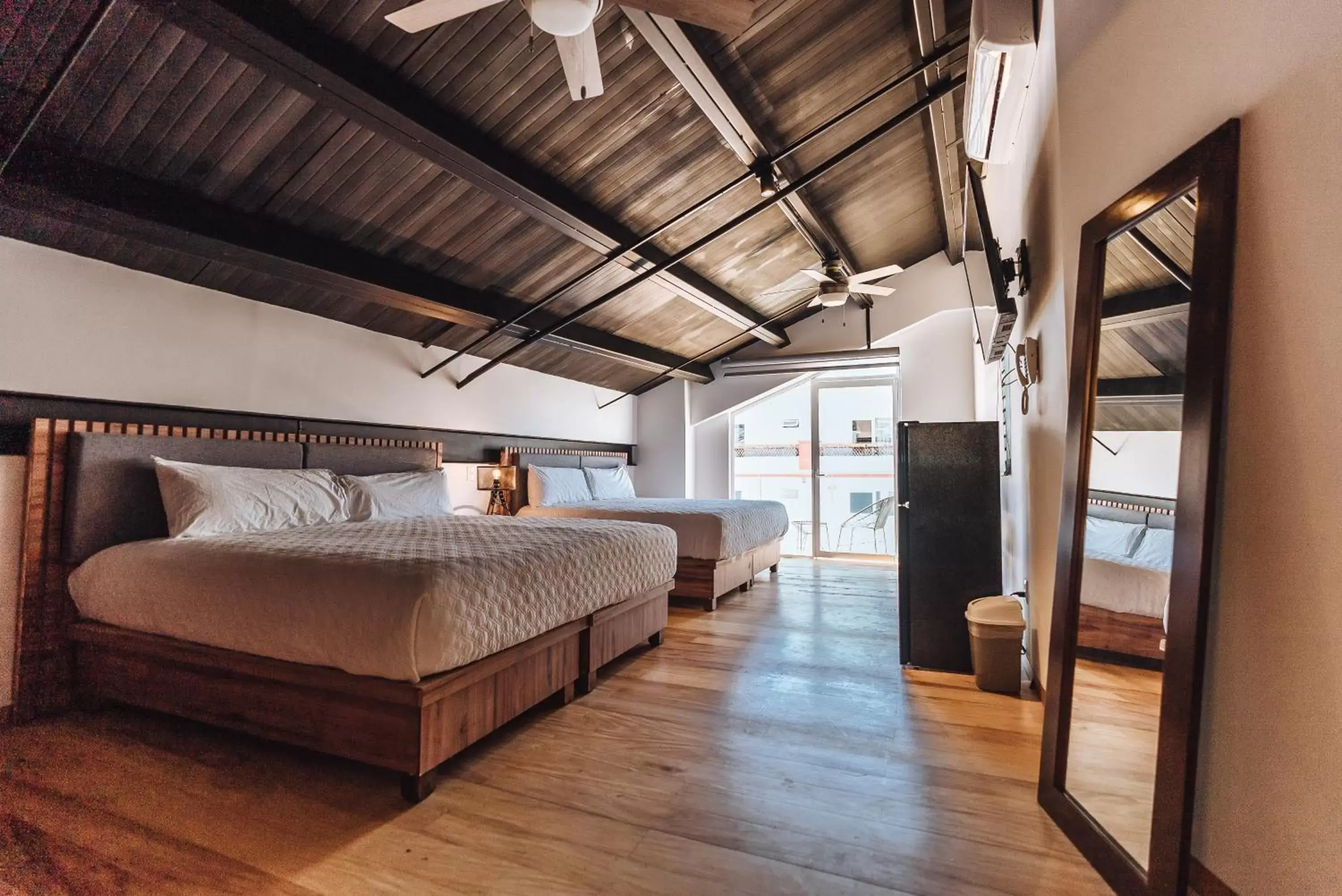 Photo of the whole room, Bed in Loft Hotel Malecón Vallarta