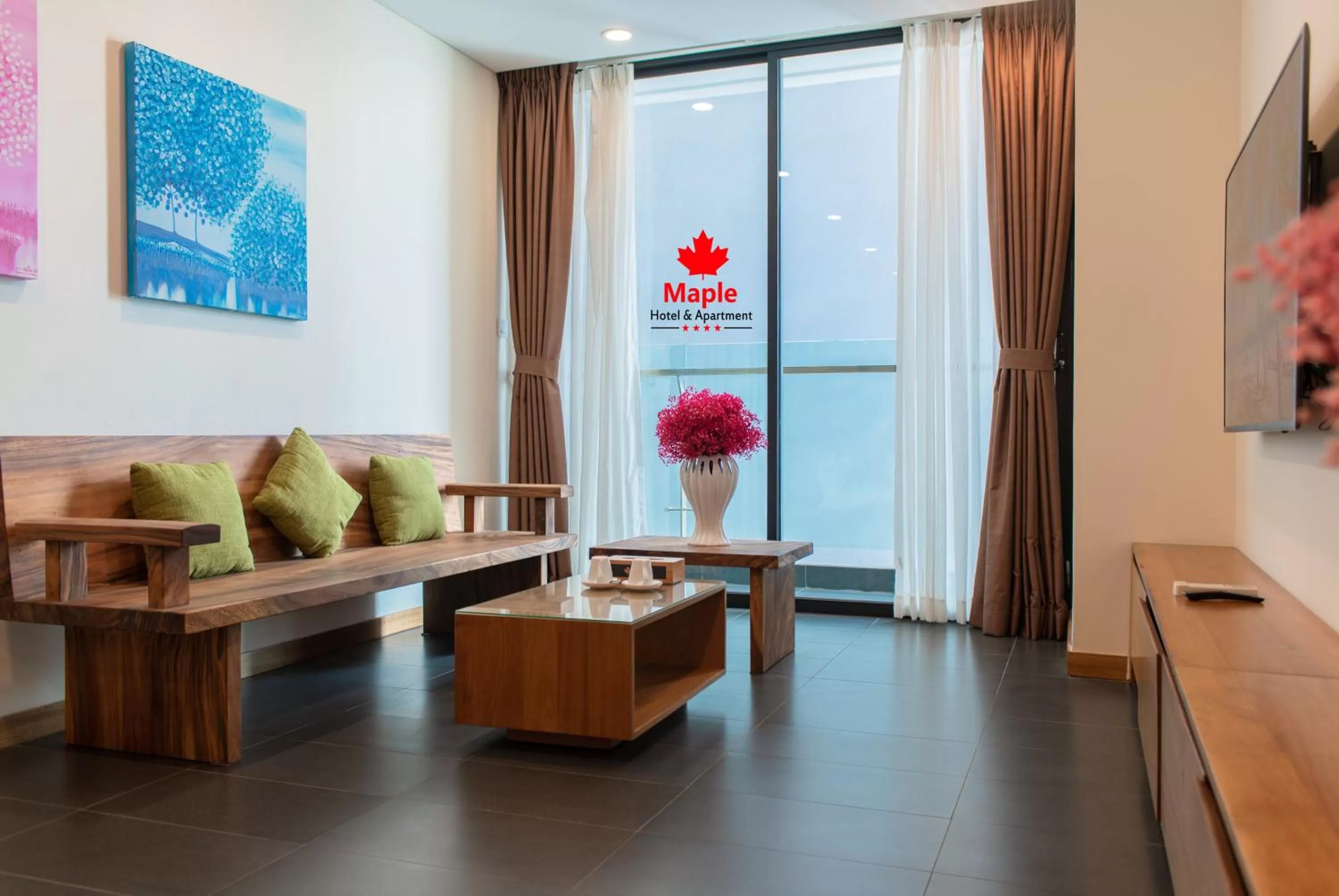 Living room in Maple Hotel & Apartment