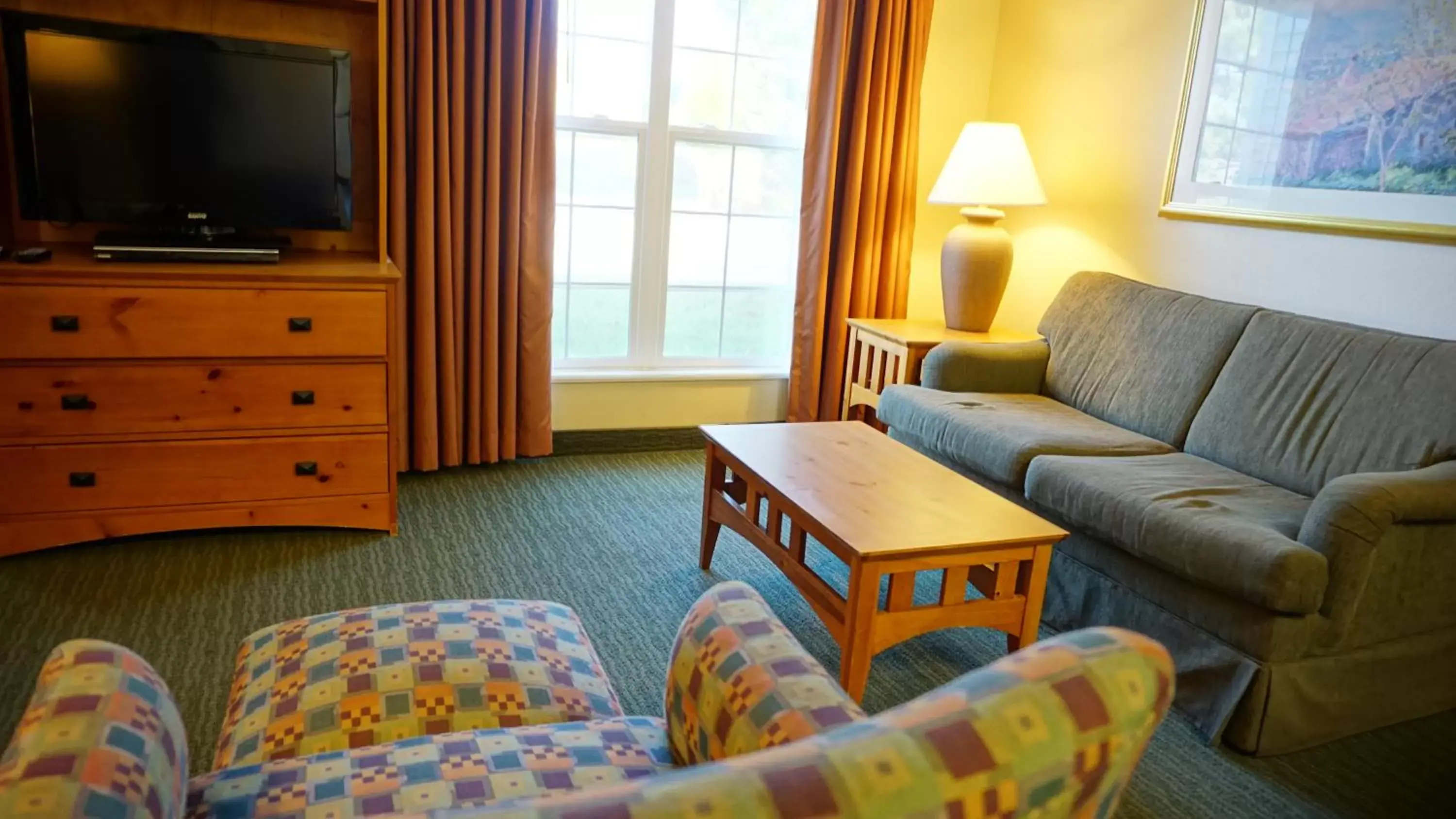 Living room in Baymont by Wyndham Wichita East Living room in Baymont by Wyndham Wichita East