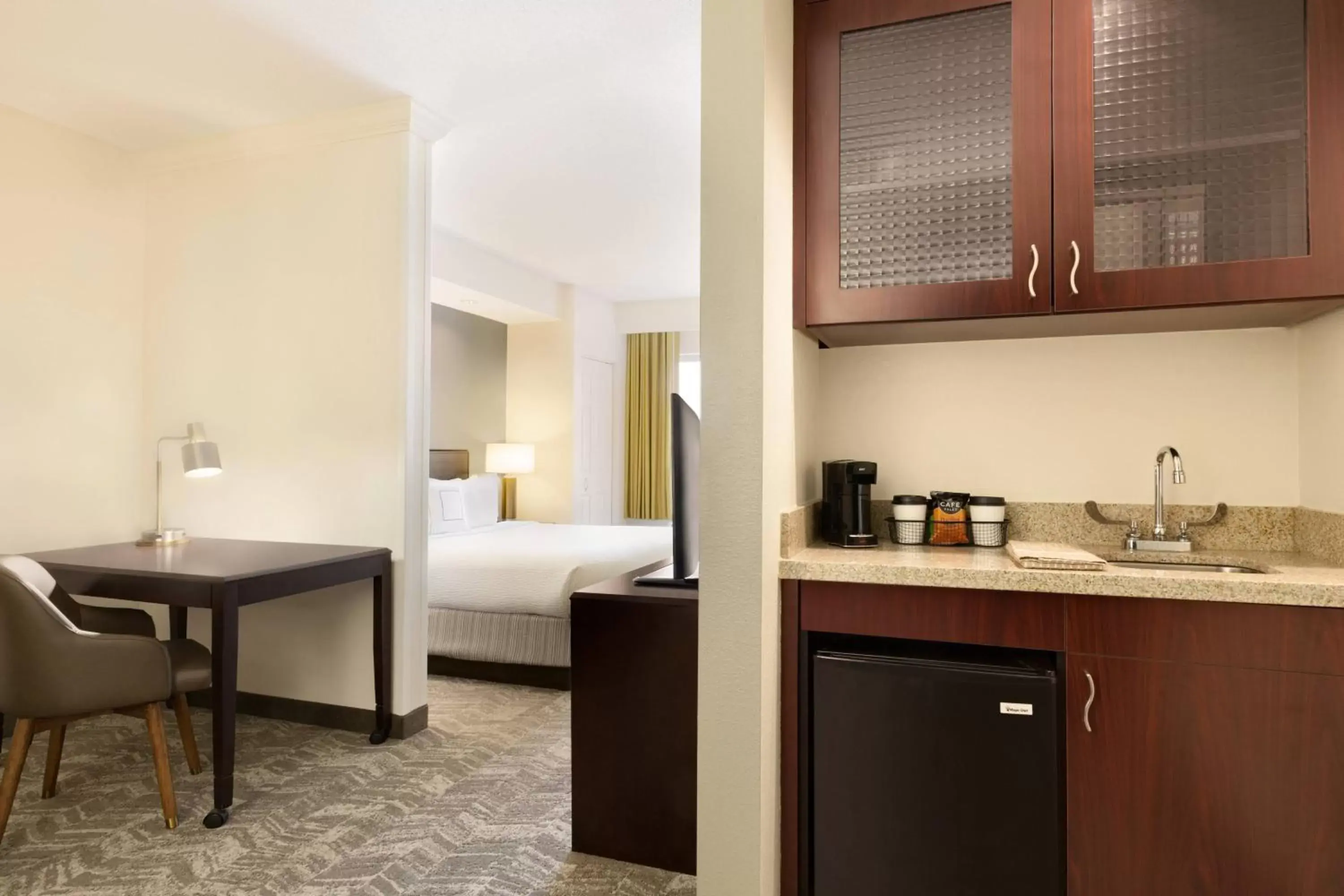 Bedroom, Kitchen/Kitchenette in Springhill Suites by Marriott West Palm Beach I-95