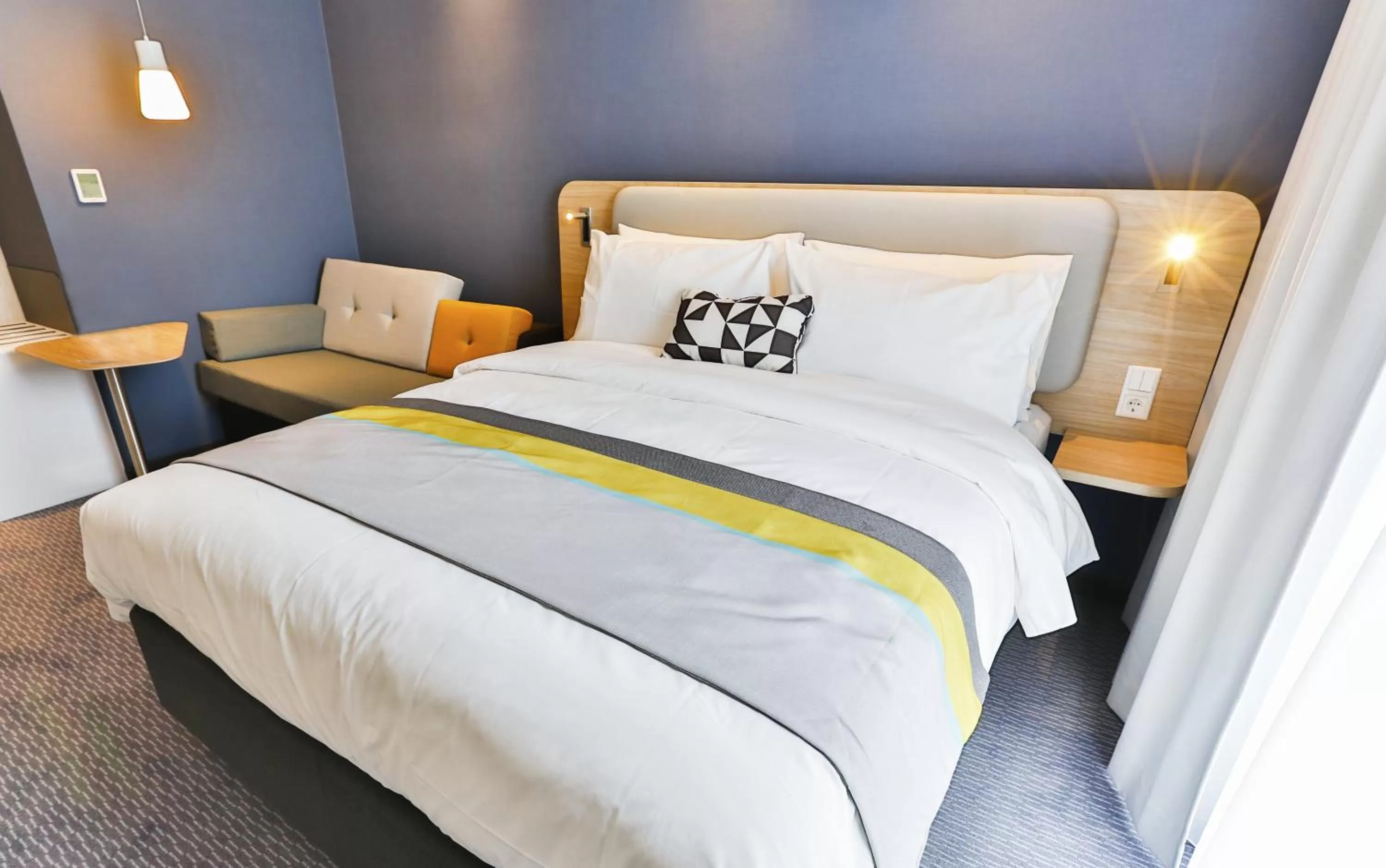 Photo of the whole room, Bed in Holiday Inn Express Karlsruhe - City Park by IHG