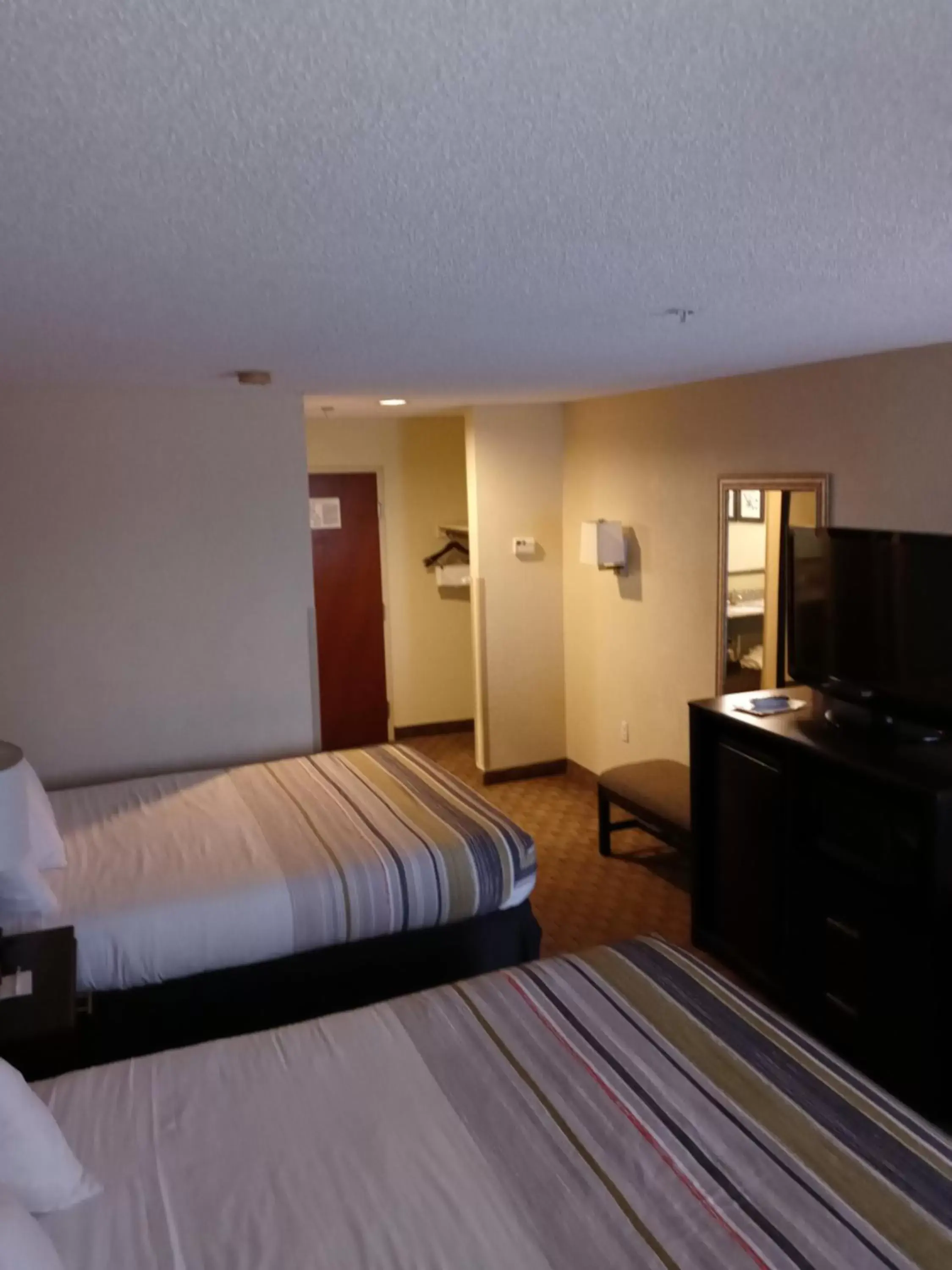 Bed in Spring Lake Inn & Suites - Fayetteville