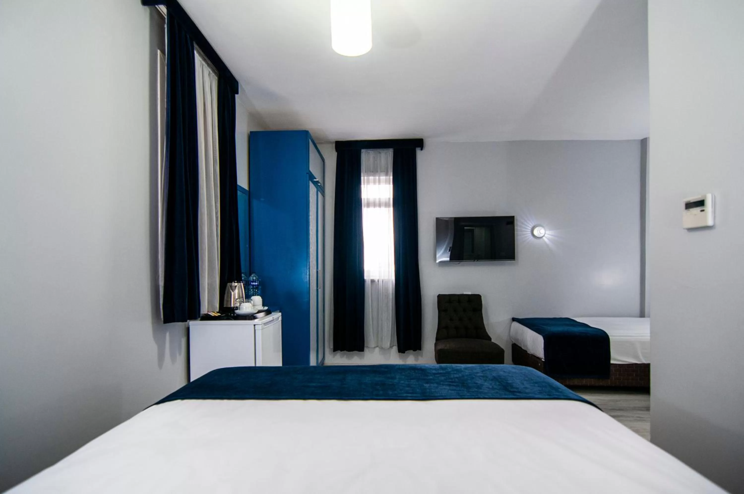 TV and multimedia, Bed in Lapis Inn Hotel & Spa ( Ex. Ambassador Hotel)