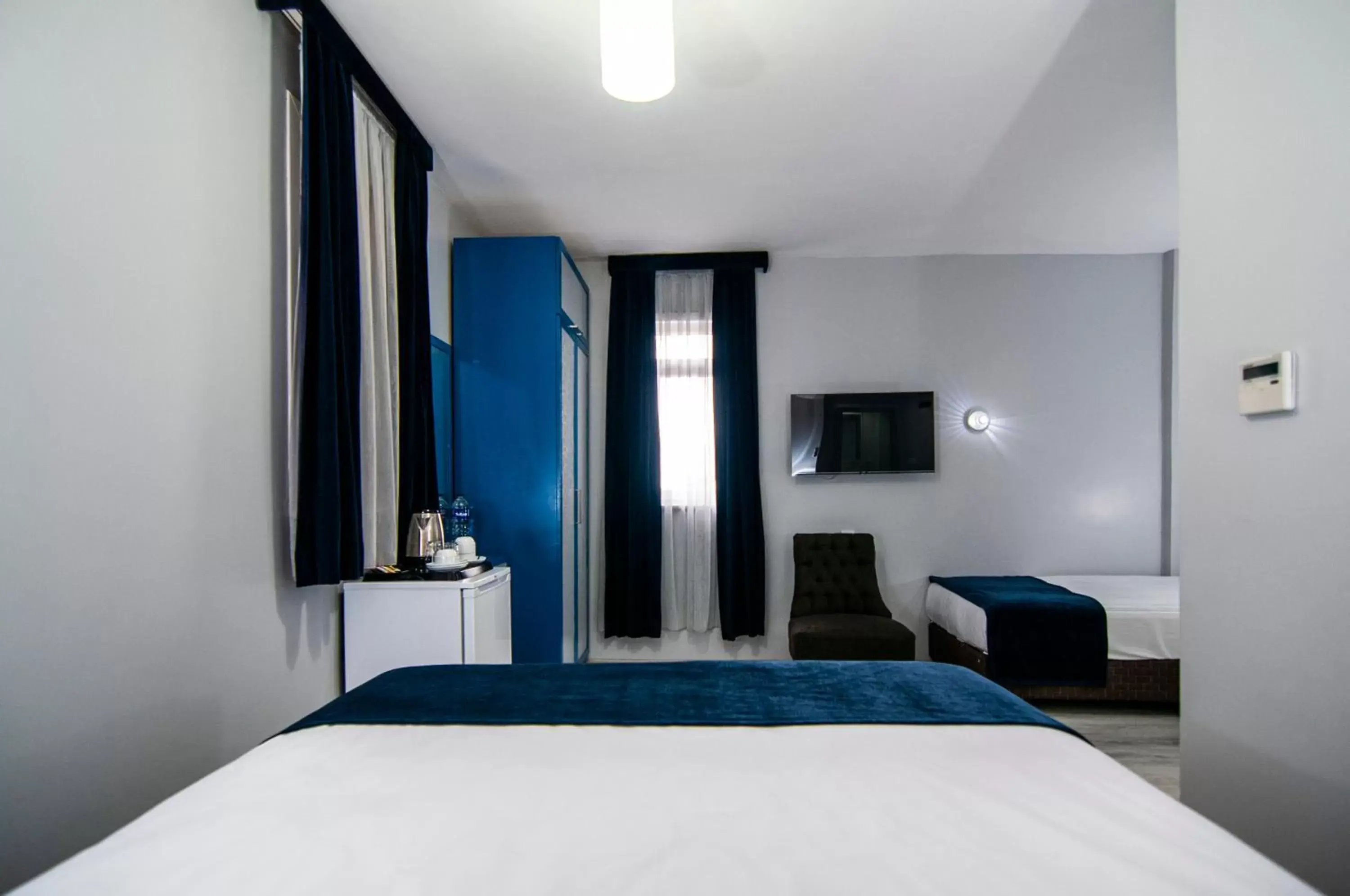TV and multimedia, Bed in Lapis Inn Hotel & Spa ( Ex. Ambassador Hotel)