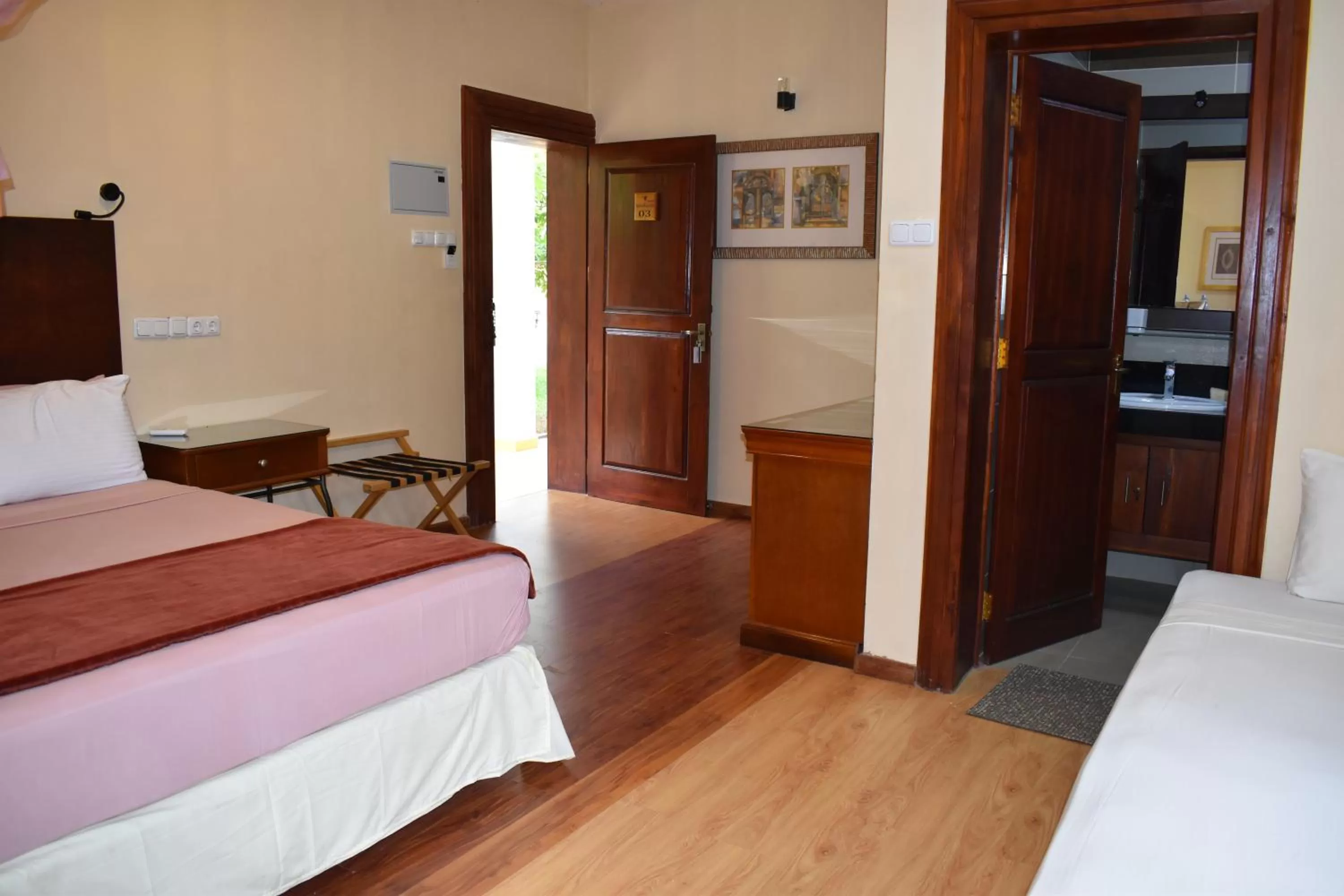 Bed in Hotel 4 U Saliya Garden