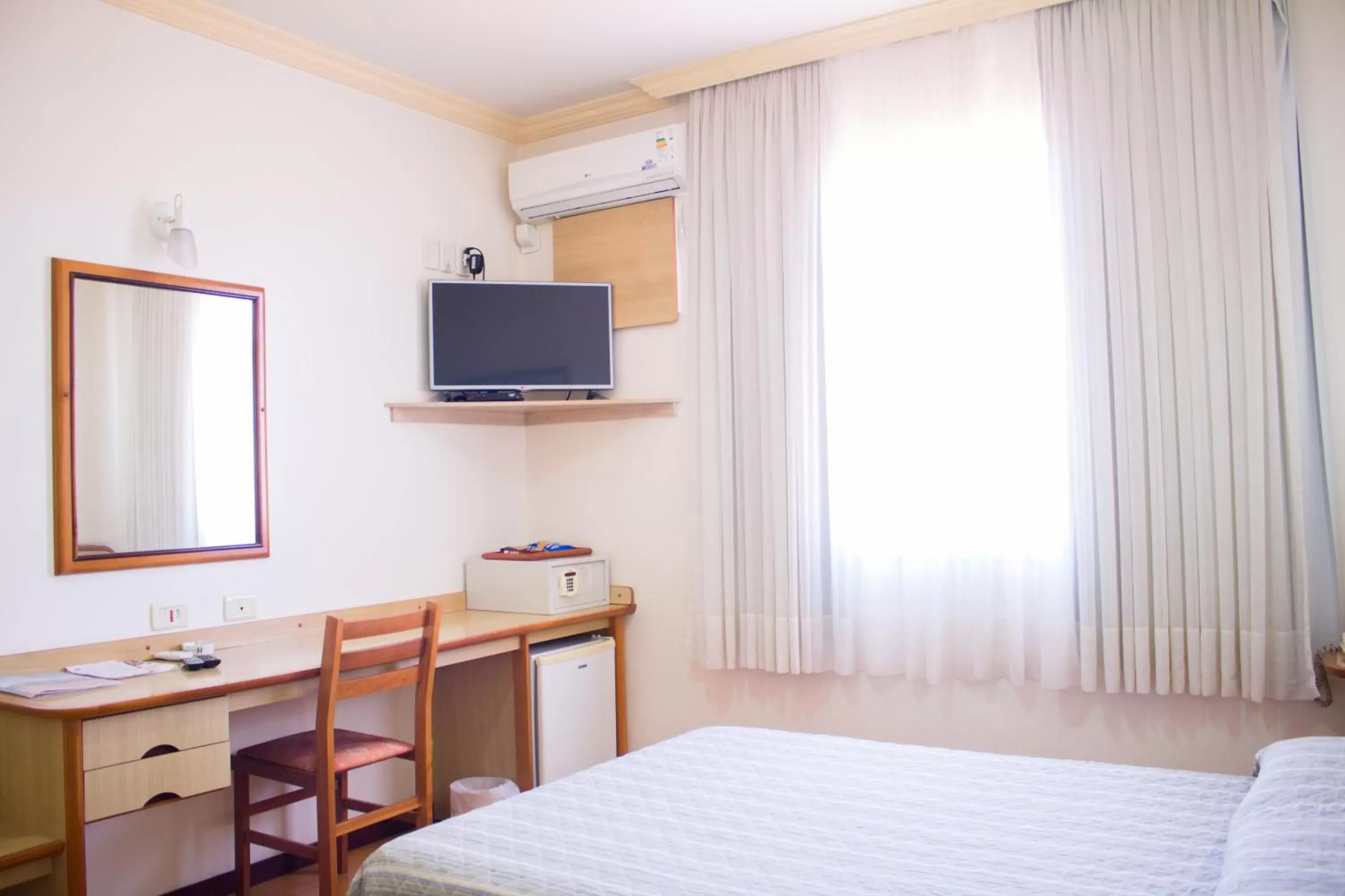 Photo of the whole room, TV/Entertainment Center in Hotel Estação 101 - Brusque