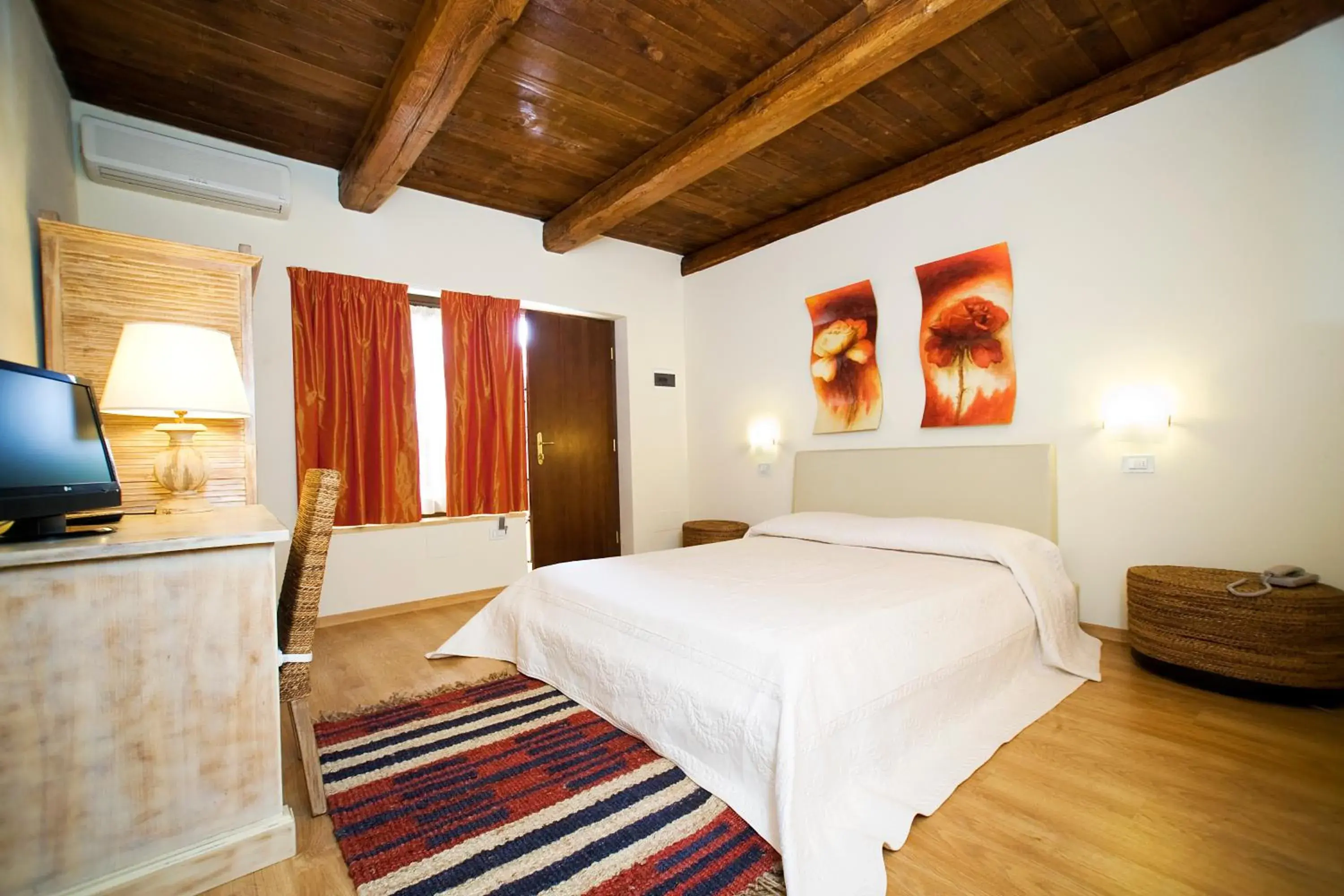 Bed in Il Baio Relais & Natural Spa