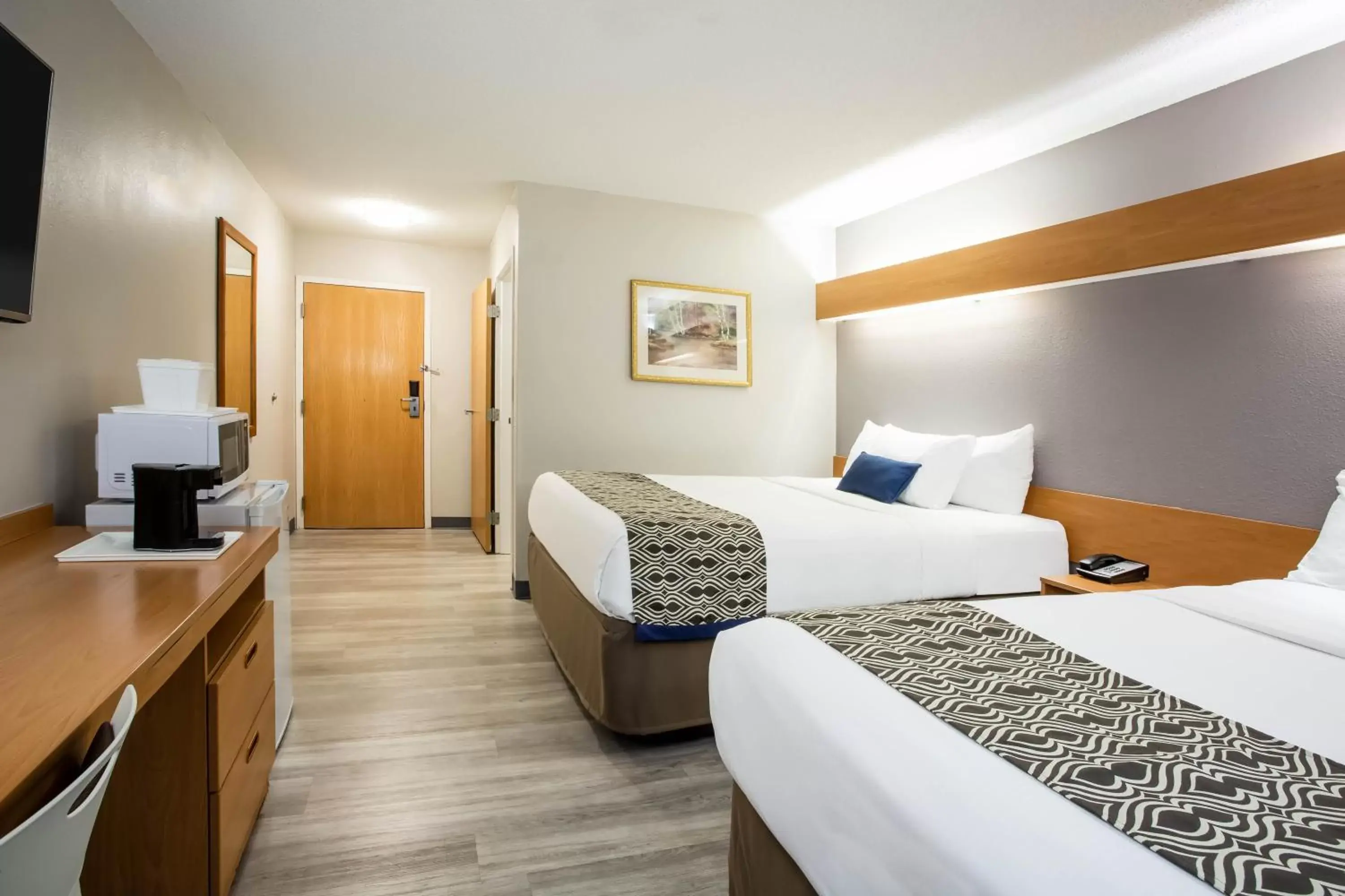 Bed in Microtel Inn & Suites by Wyndham Southern Pines Pinehurst