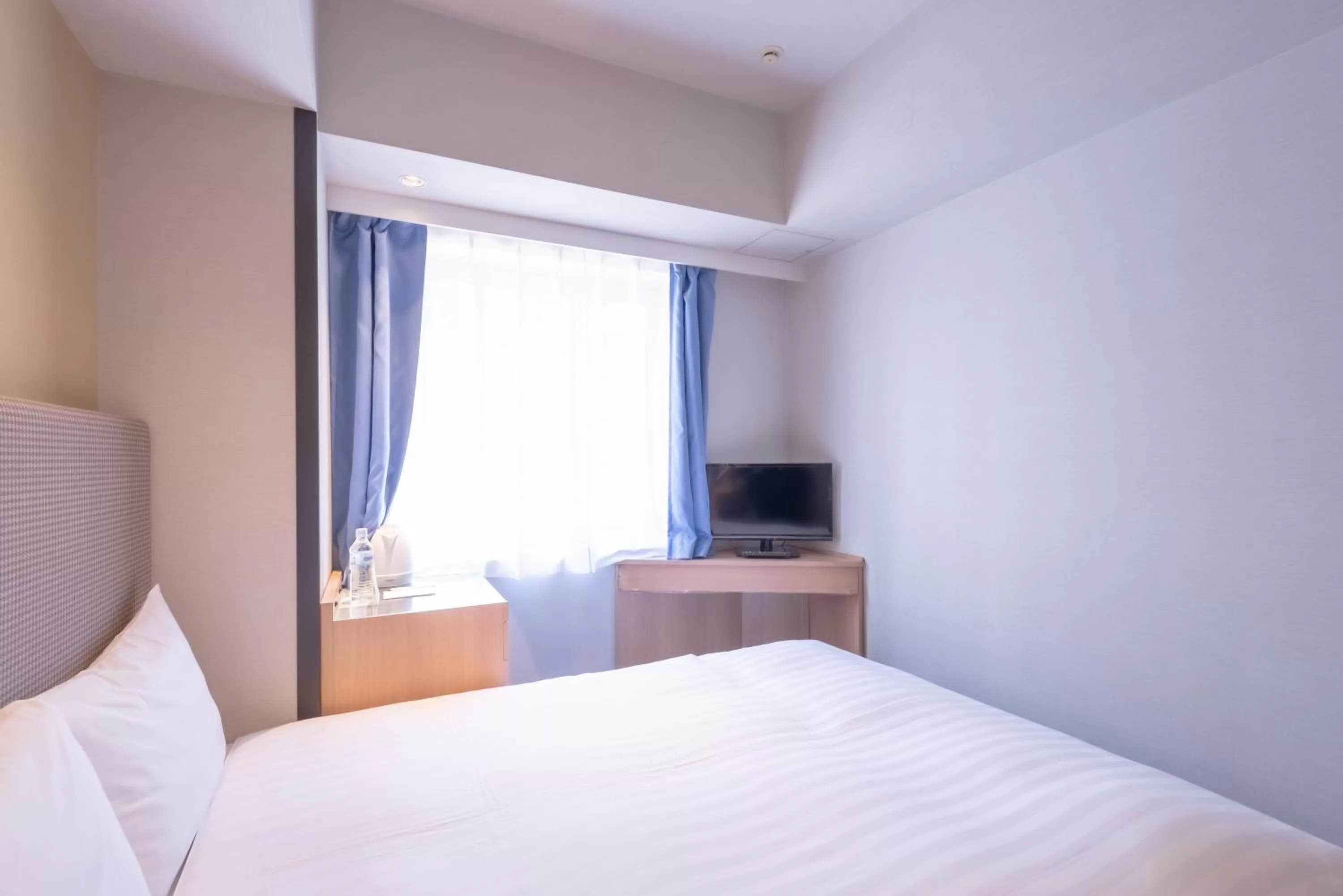 Bed in E Hotel Higashi Shinjuku