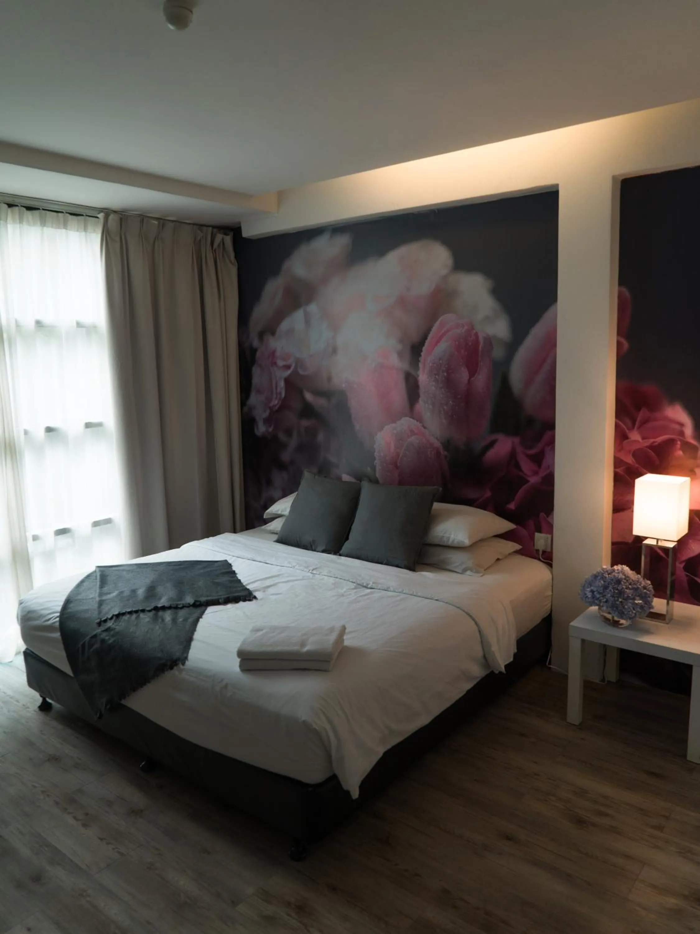 Photo of the whole room, Bed in V Garden Hotel