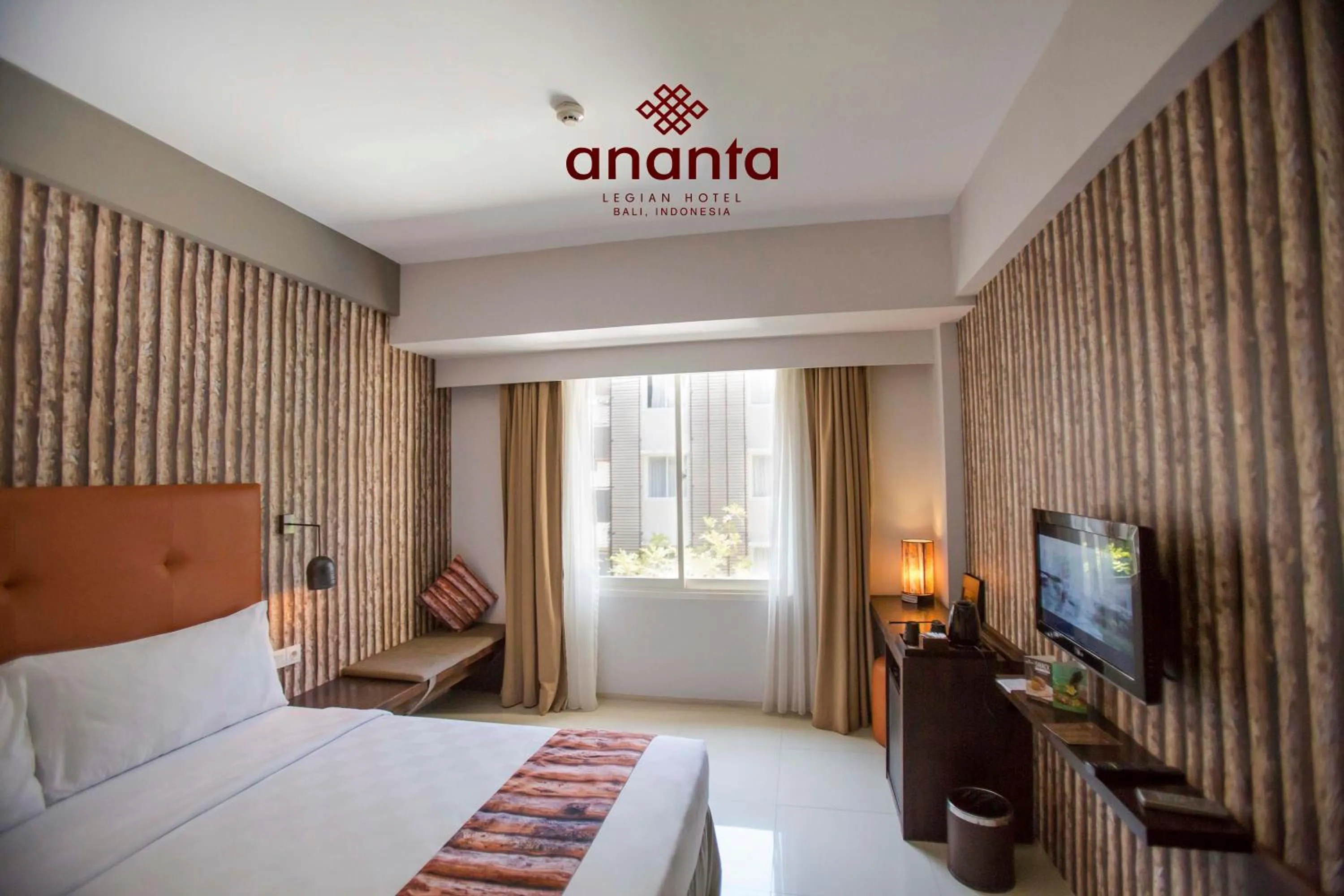 Bed in Ananta Legian Hotel