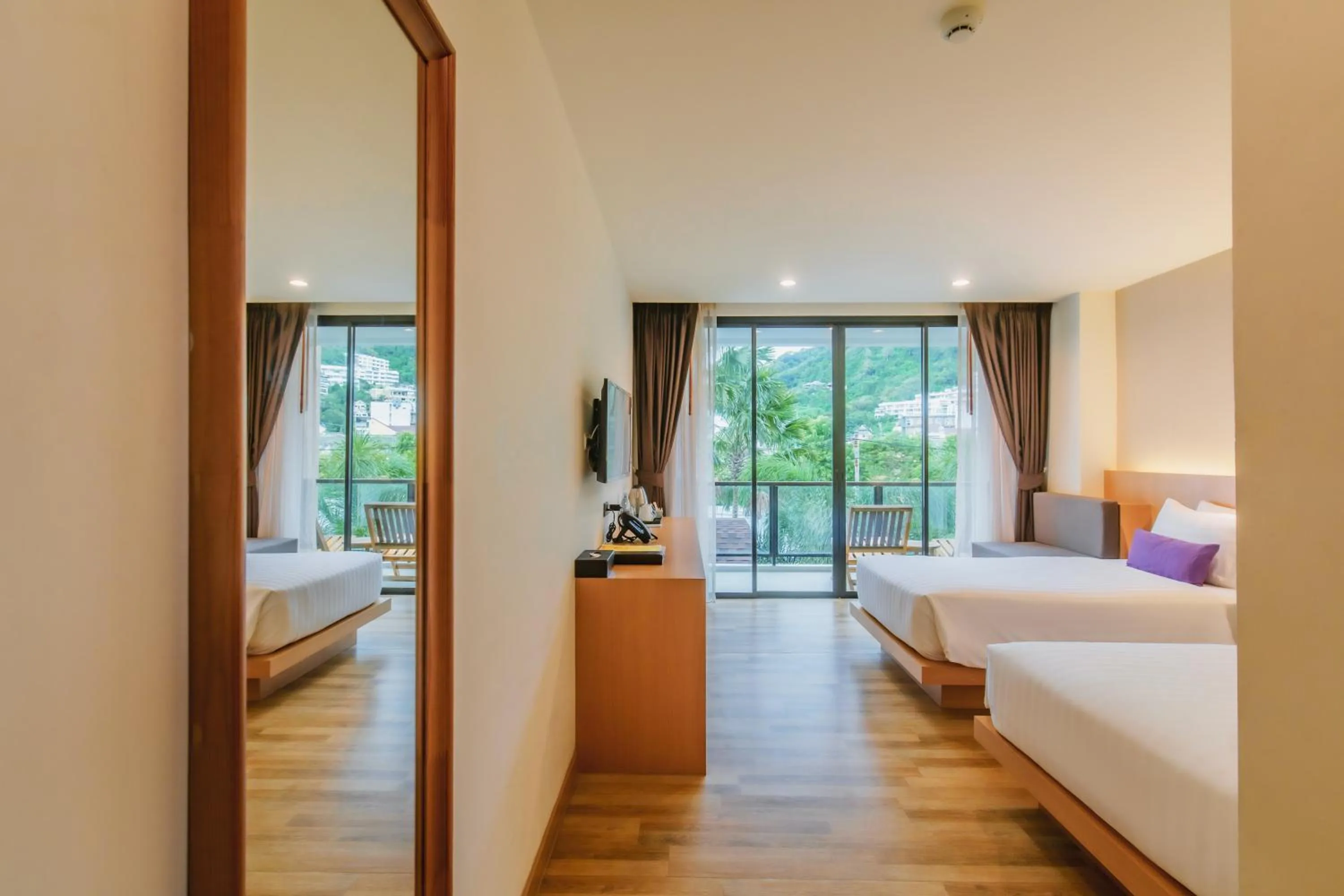 Photo of the whole room, Bed in The Lunar Patong