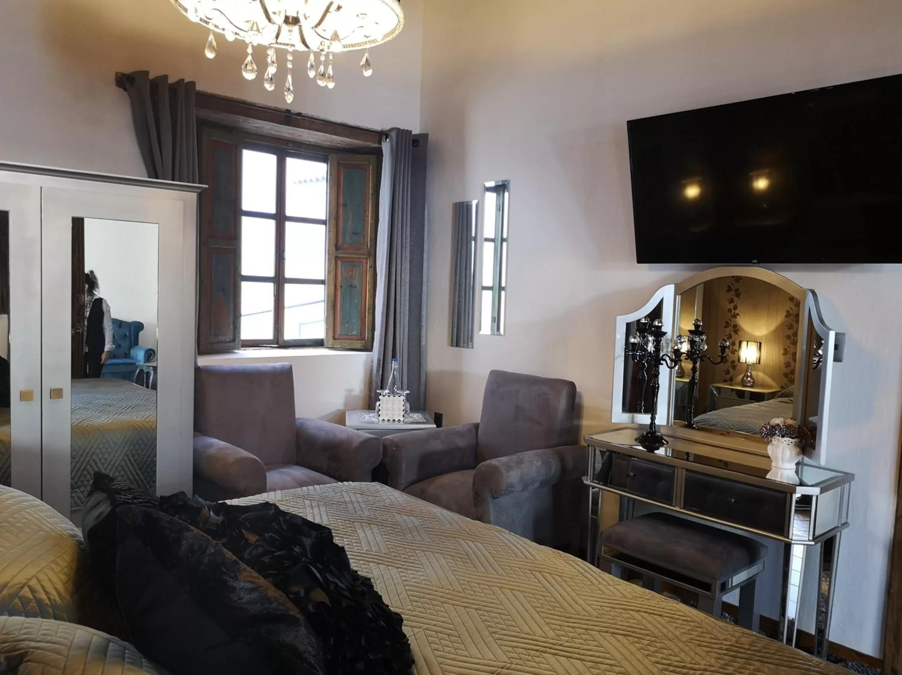 Seating area, TV/Entertainment Center in Hotel Boutique Amorini