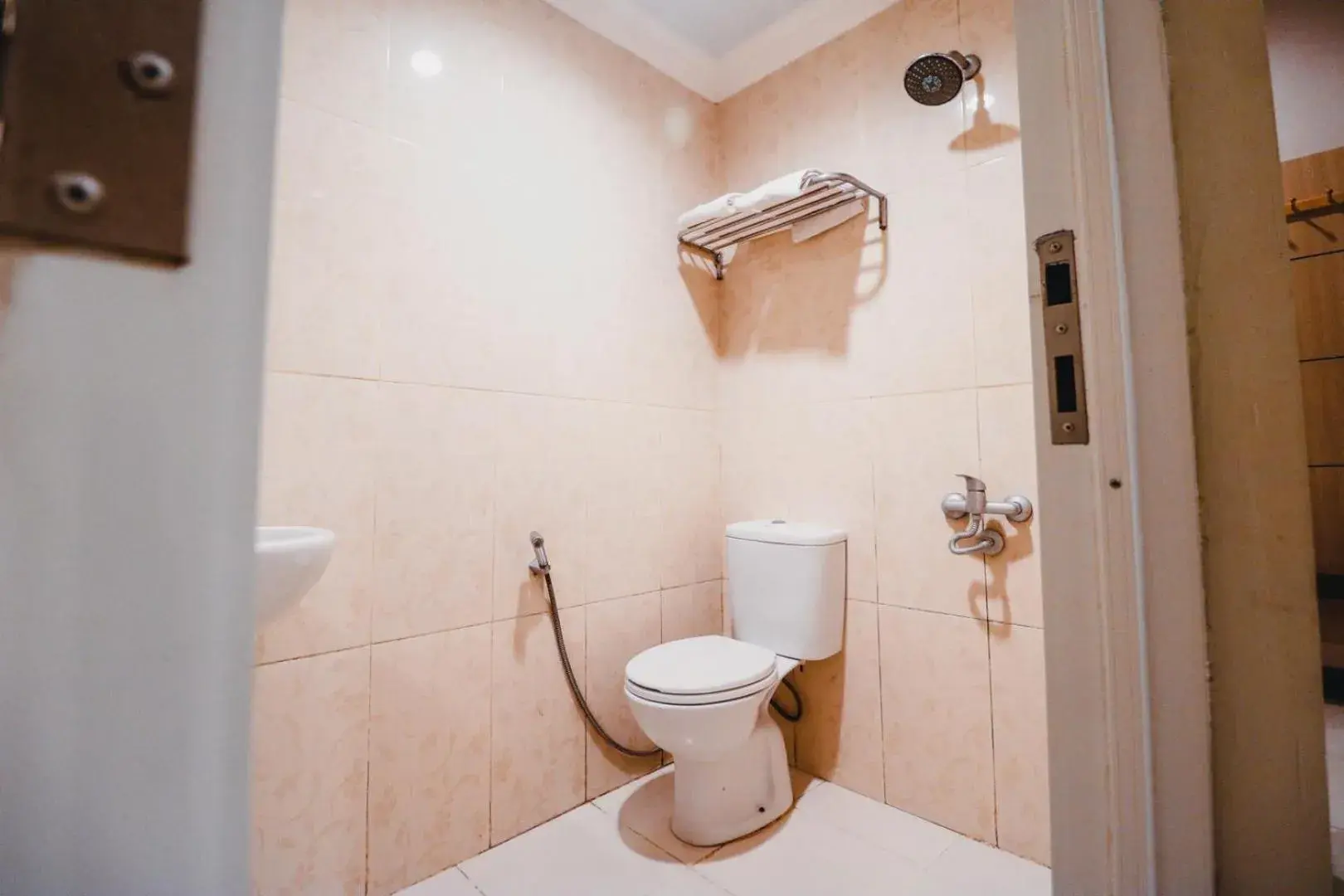 Bathroom in Reddoorz Plus near Makassar Town Square