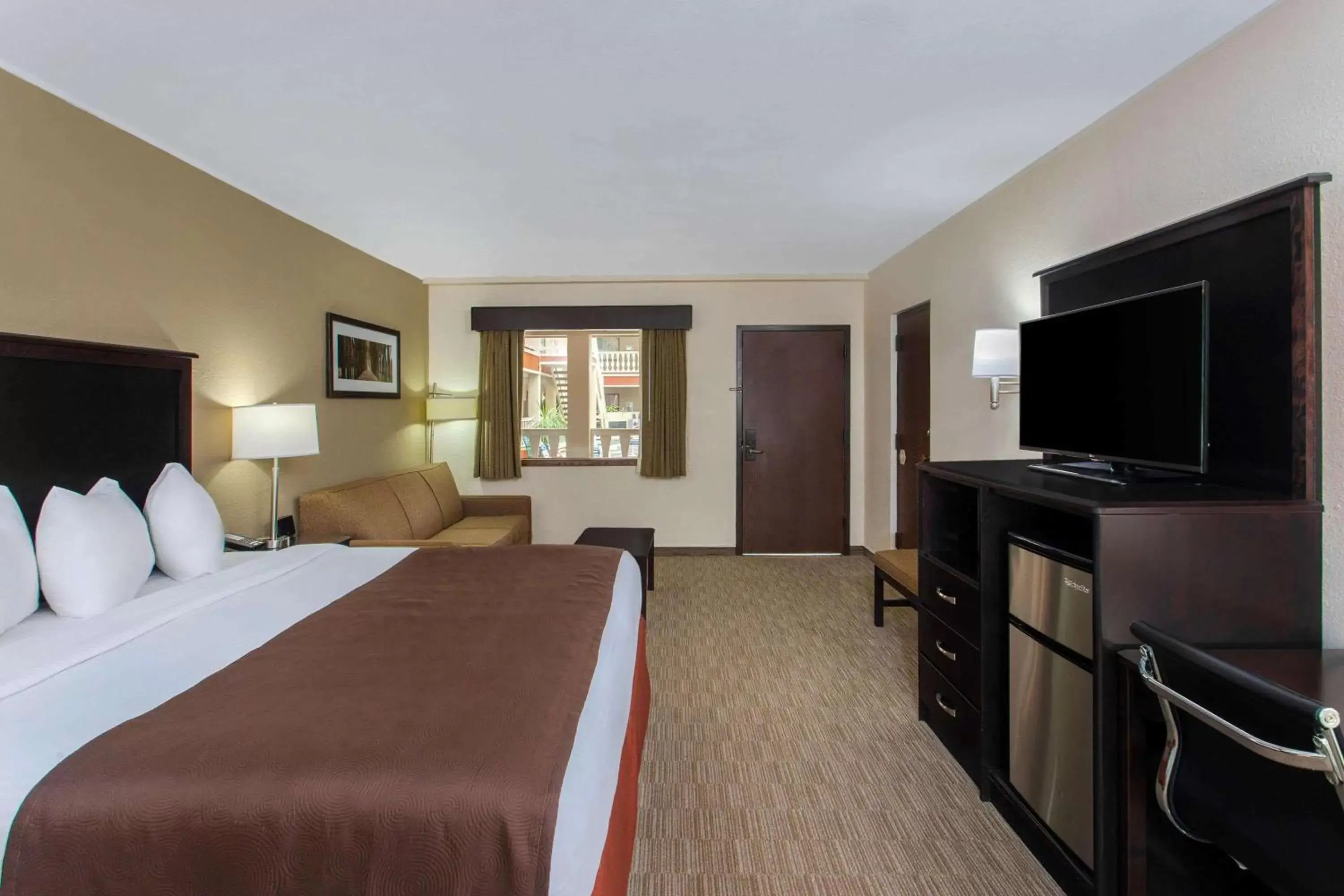 Photo of the whole room, Bed in AmericInn by Wyndham Janesville