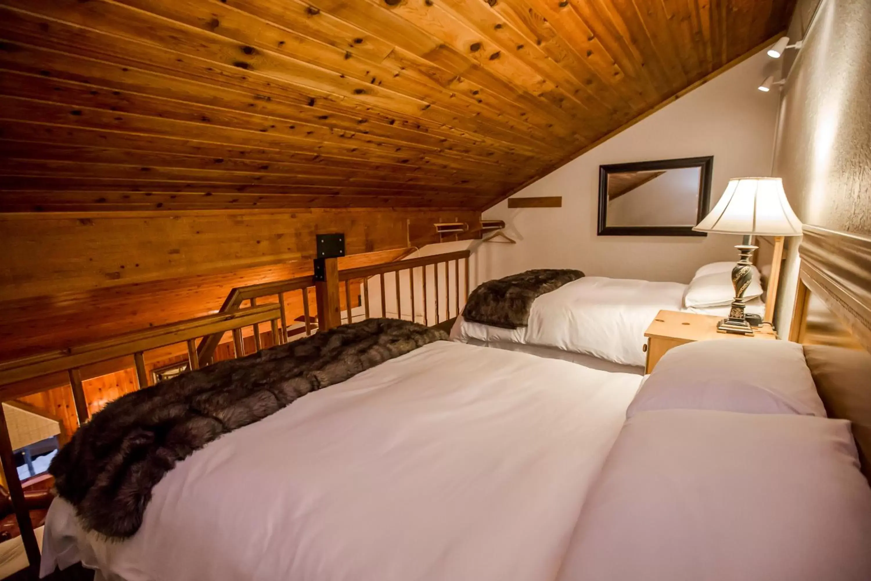 Bed in Kandahar Lodge at Whitefish Mountain Resort