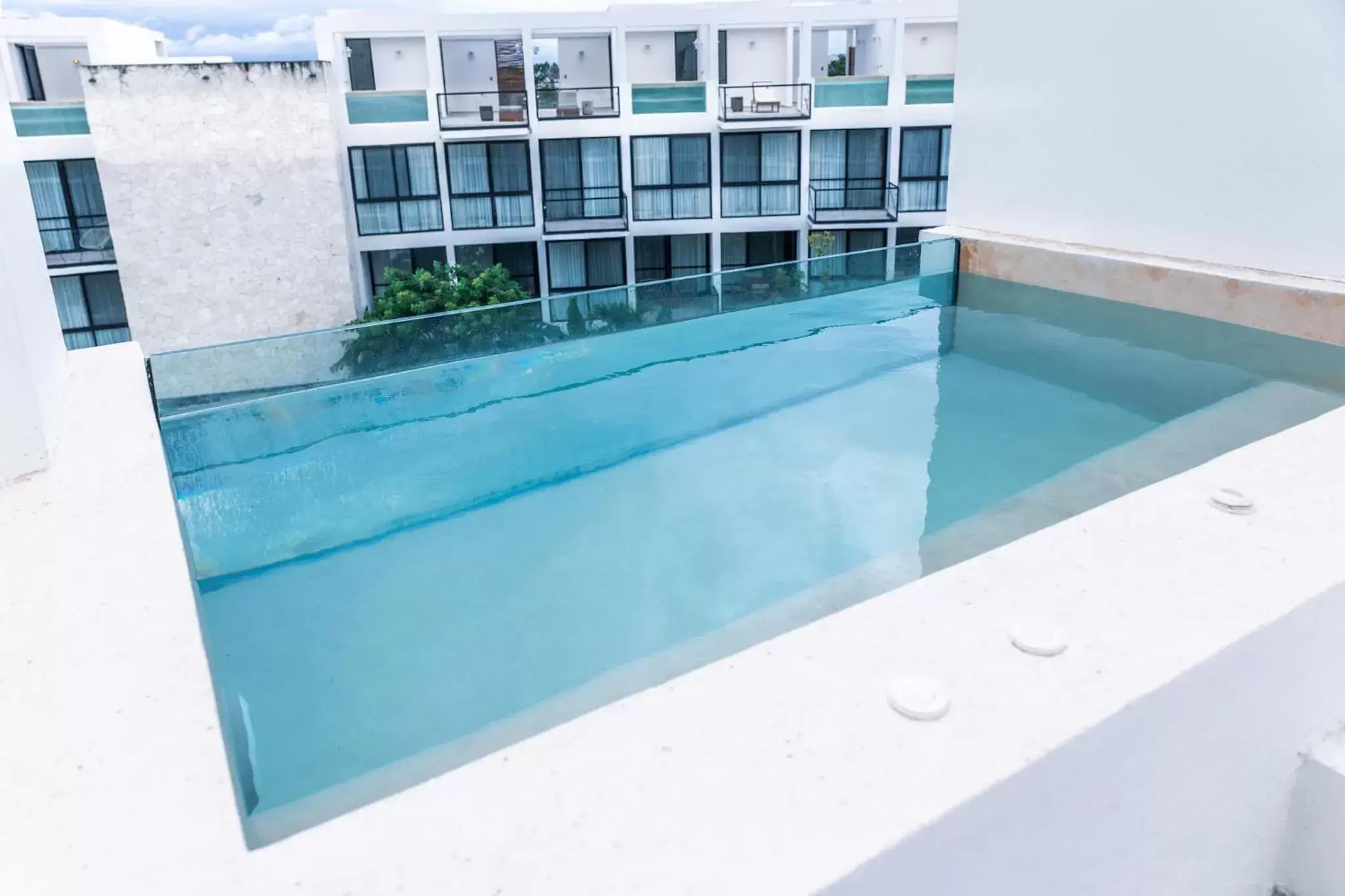 Balcony/Terrace, Swimming Pool in The Waves Tulum