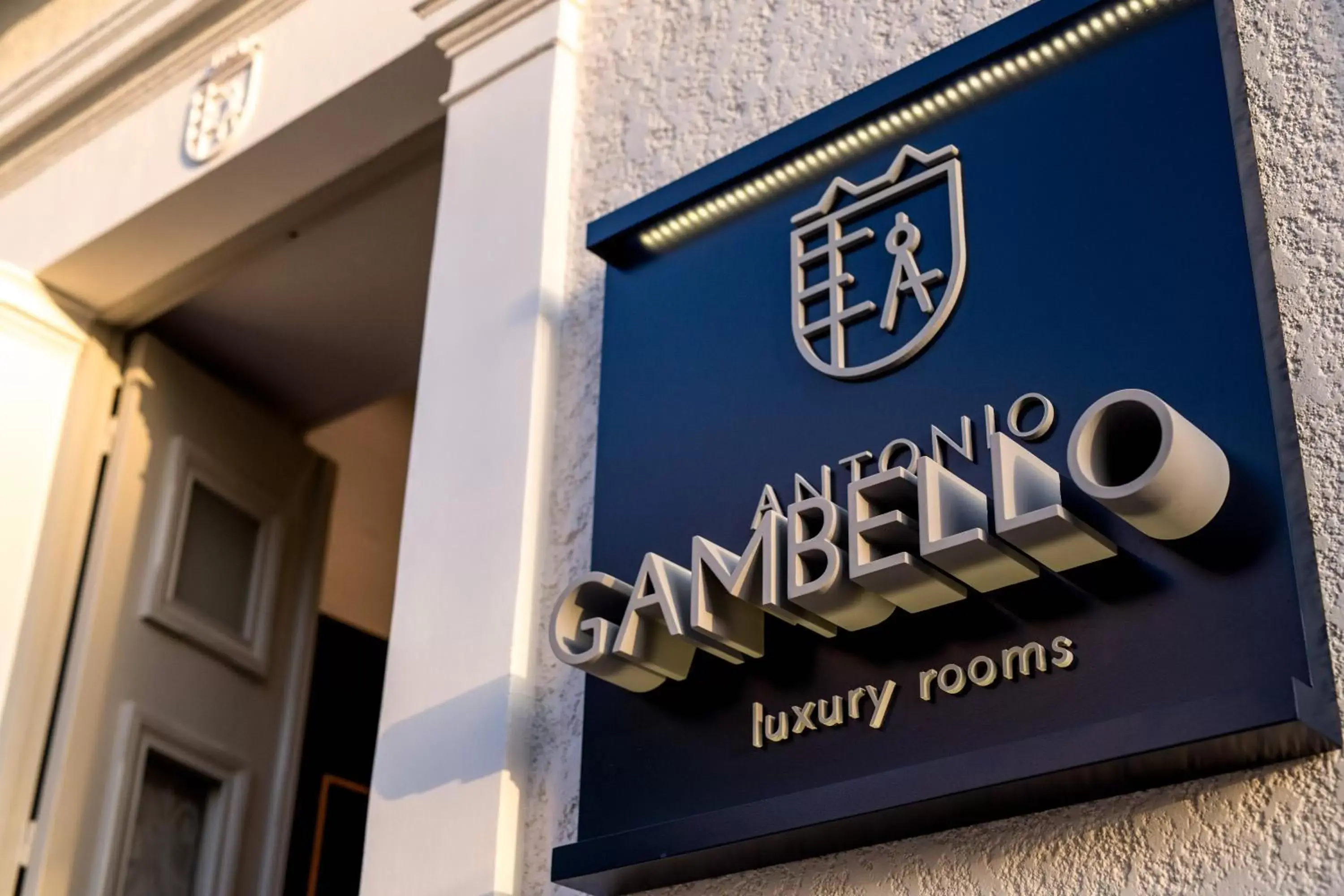 Property logo or sign in Gambello Luxury Rooms