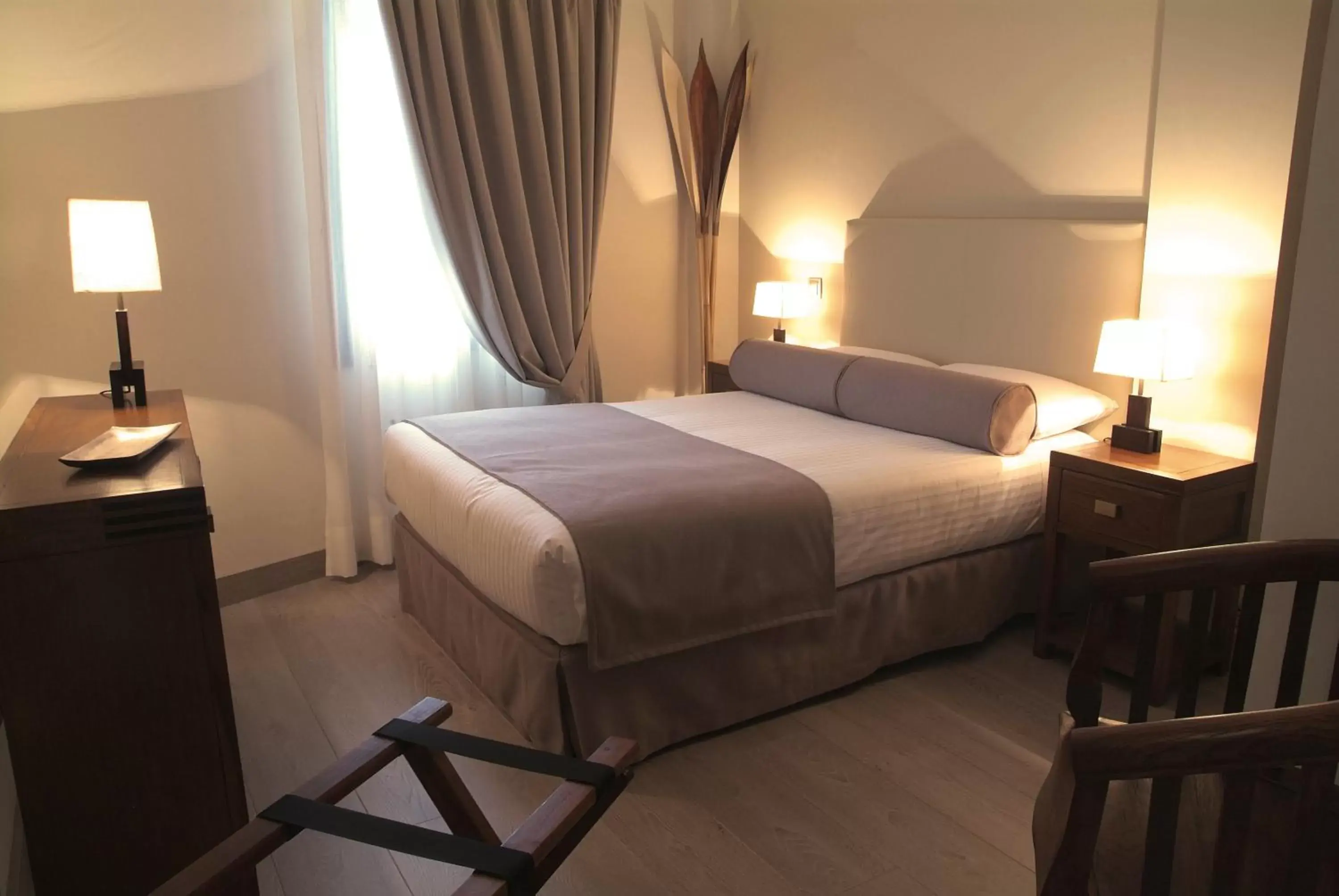 Bed in Le Petit Boutique Hotel