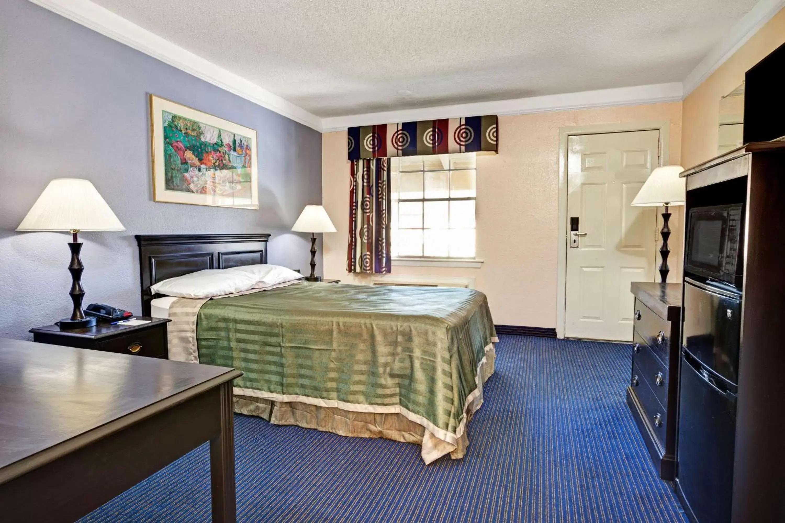 Photo of the whole room in Travelodge by Wyndham North Richland Hills/Dallas/Ft Worth