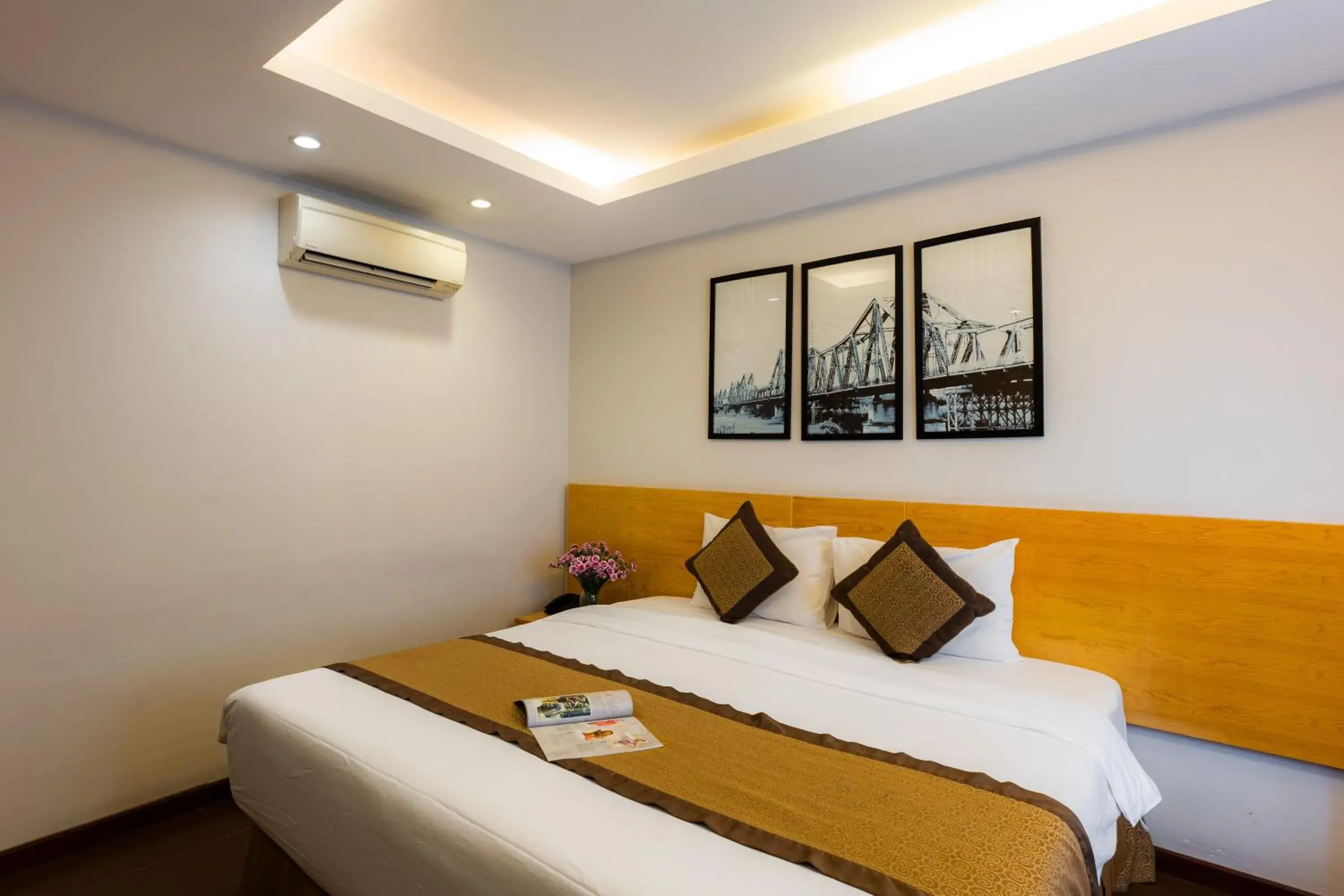 Bed in Riverside Hanoi Hotel