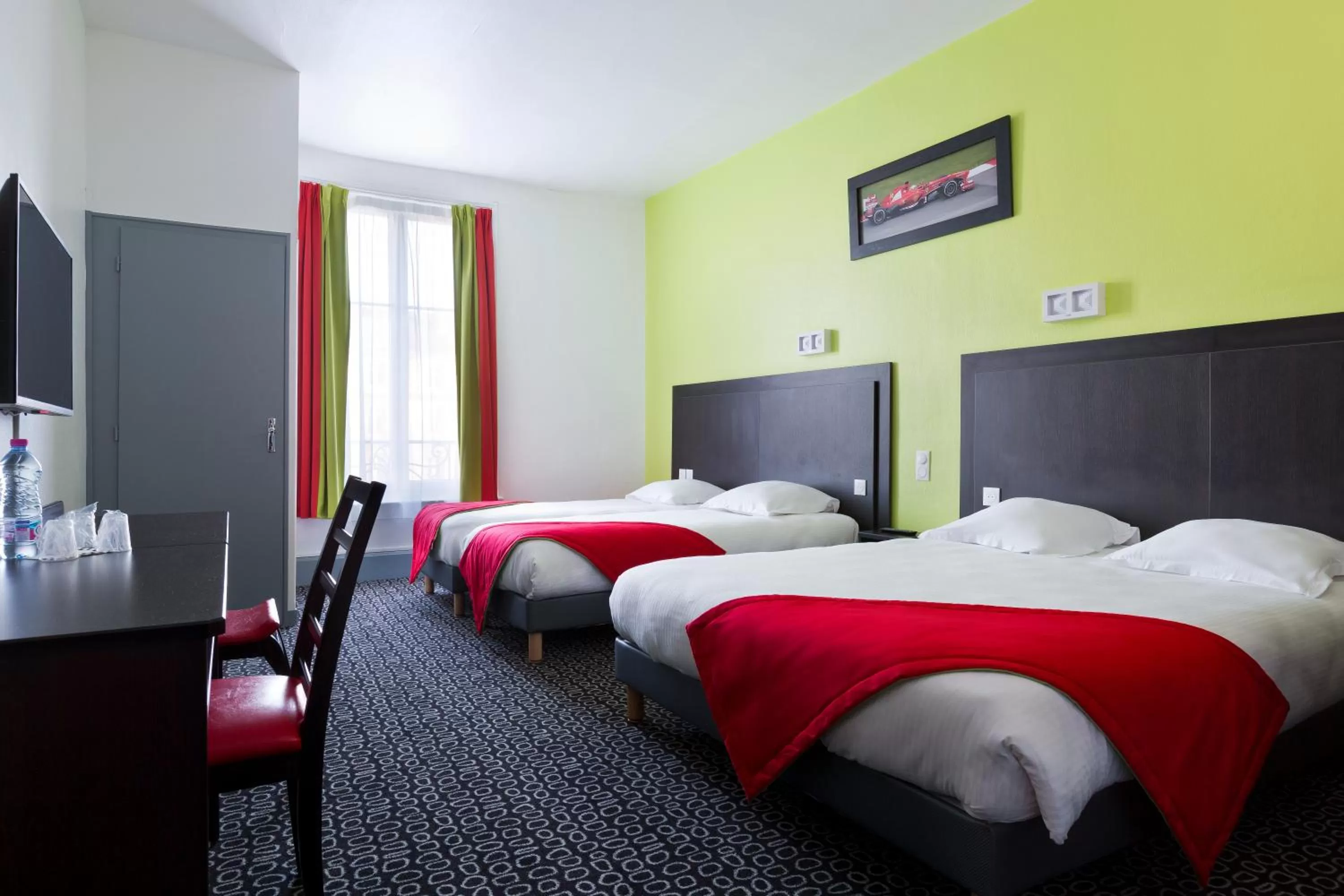 Bed in Enzo Hotels Contrexeville