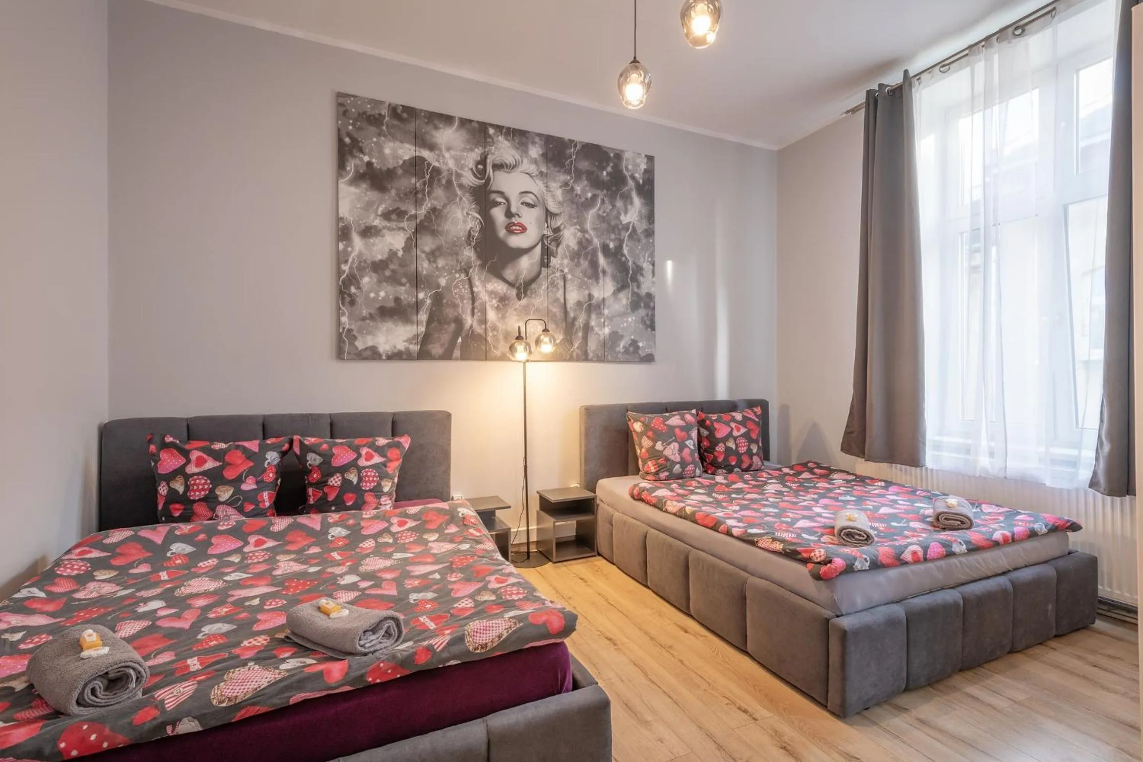 Bed in Queen Apartments