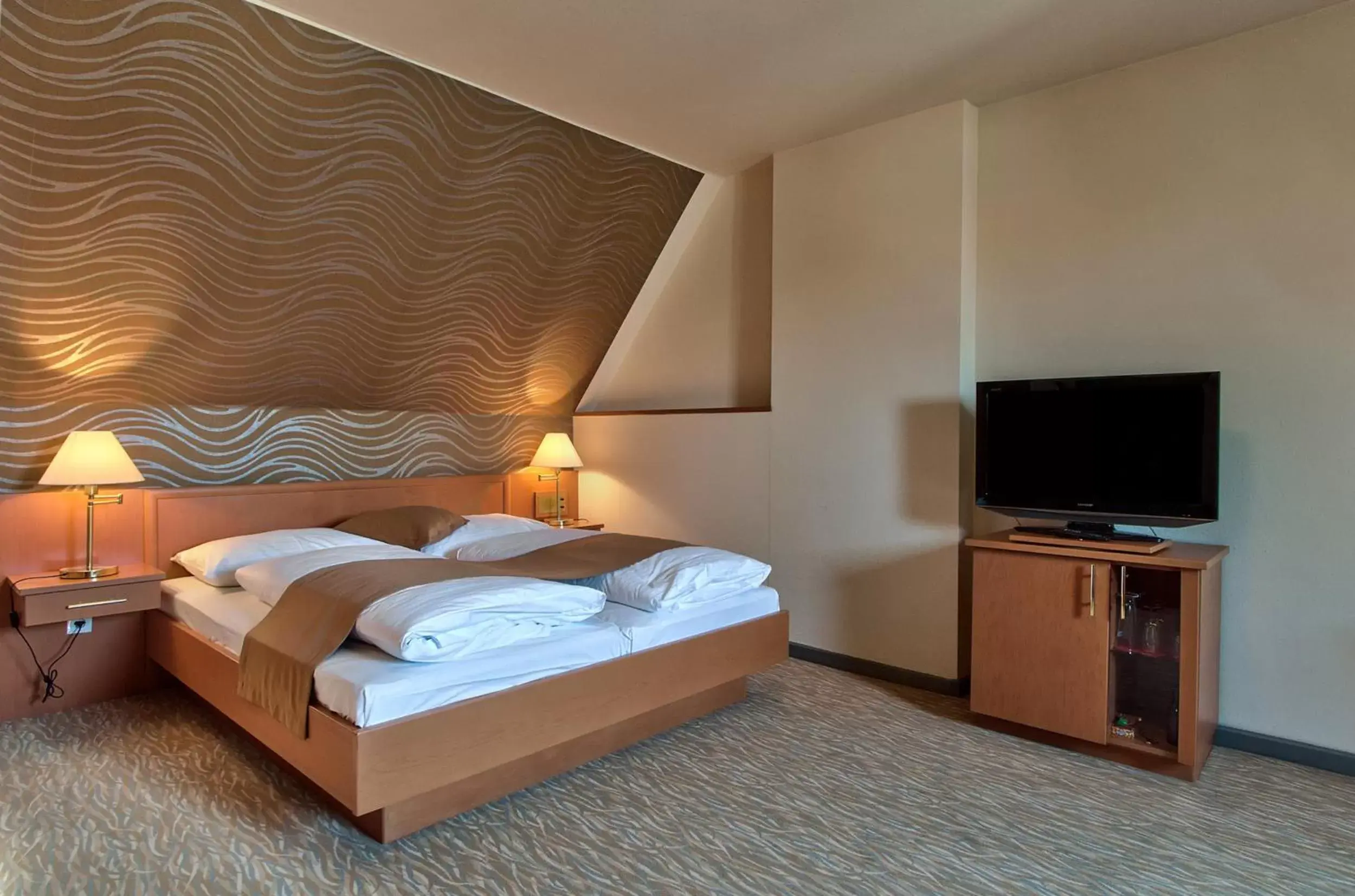 Bed in Club Hotel Cortina