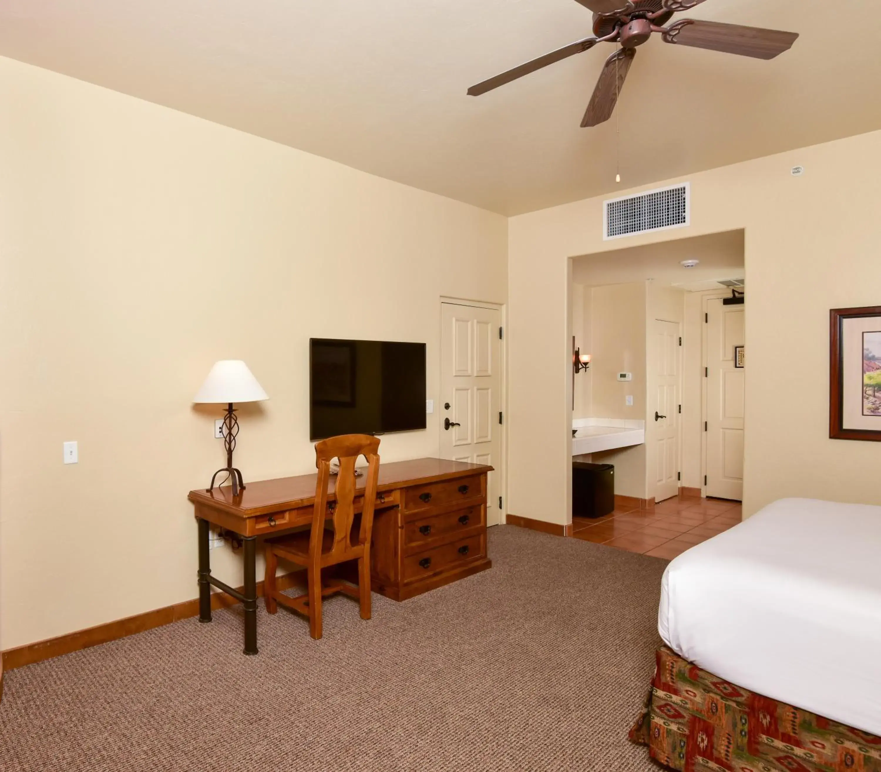 Bedroom, TV/Entertainment Center in Lodge On The Desert