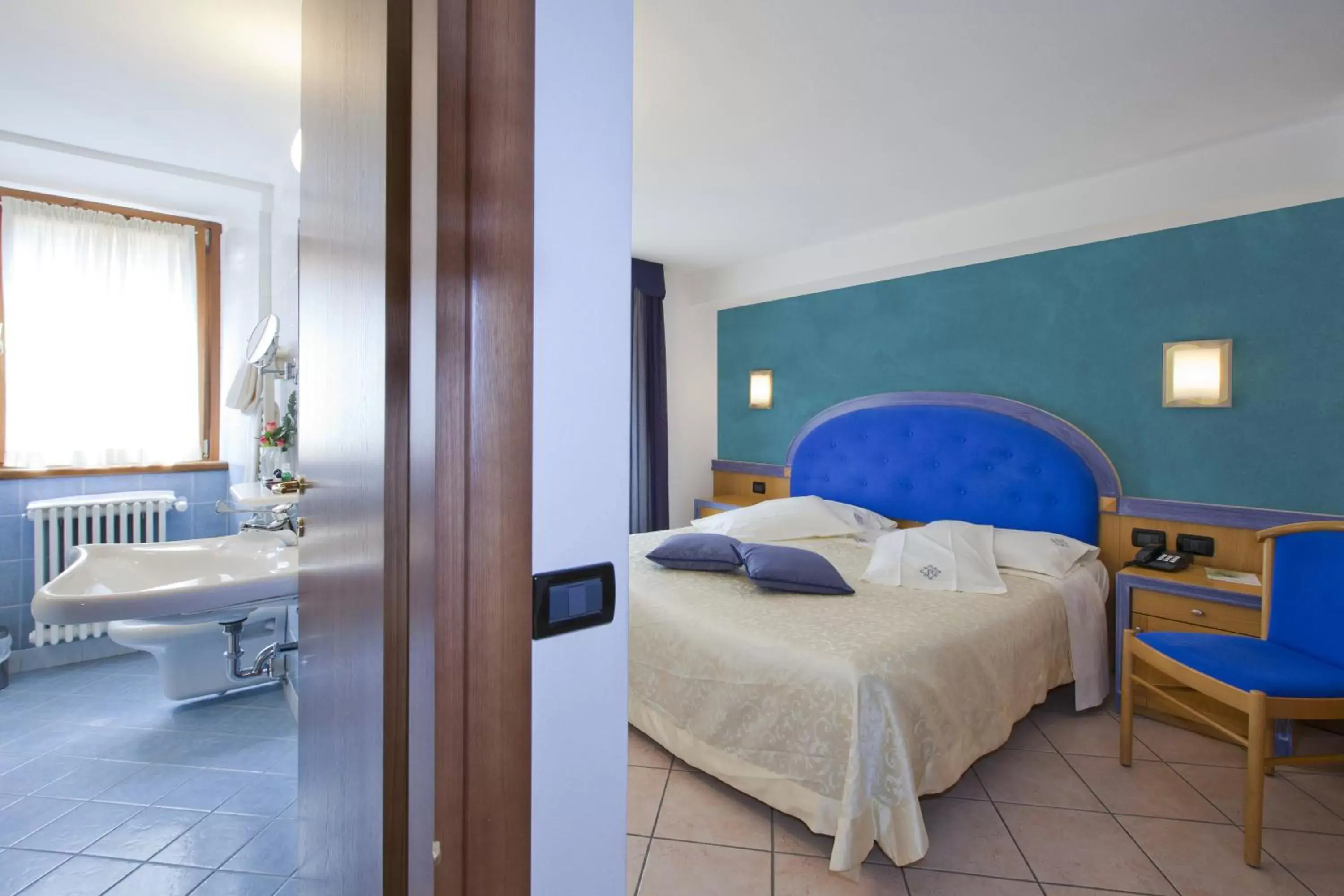 Quadruple Room with Private Bathroom - single occupancy in Hotel Ambra Quadruple Room with Private Bathroom - single occupancy in Hotel Ambra