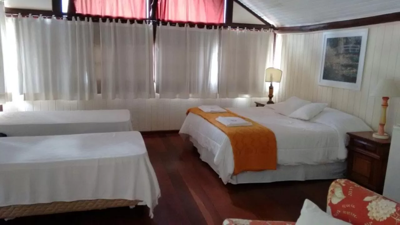 Bed in Pousada Mariza