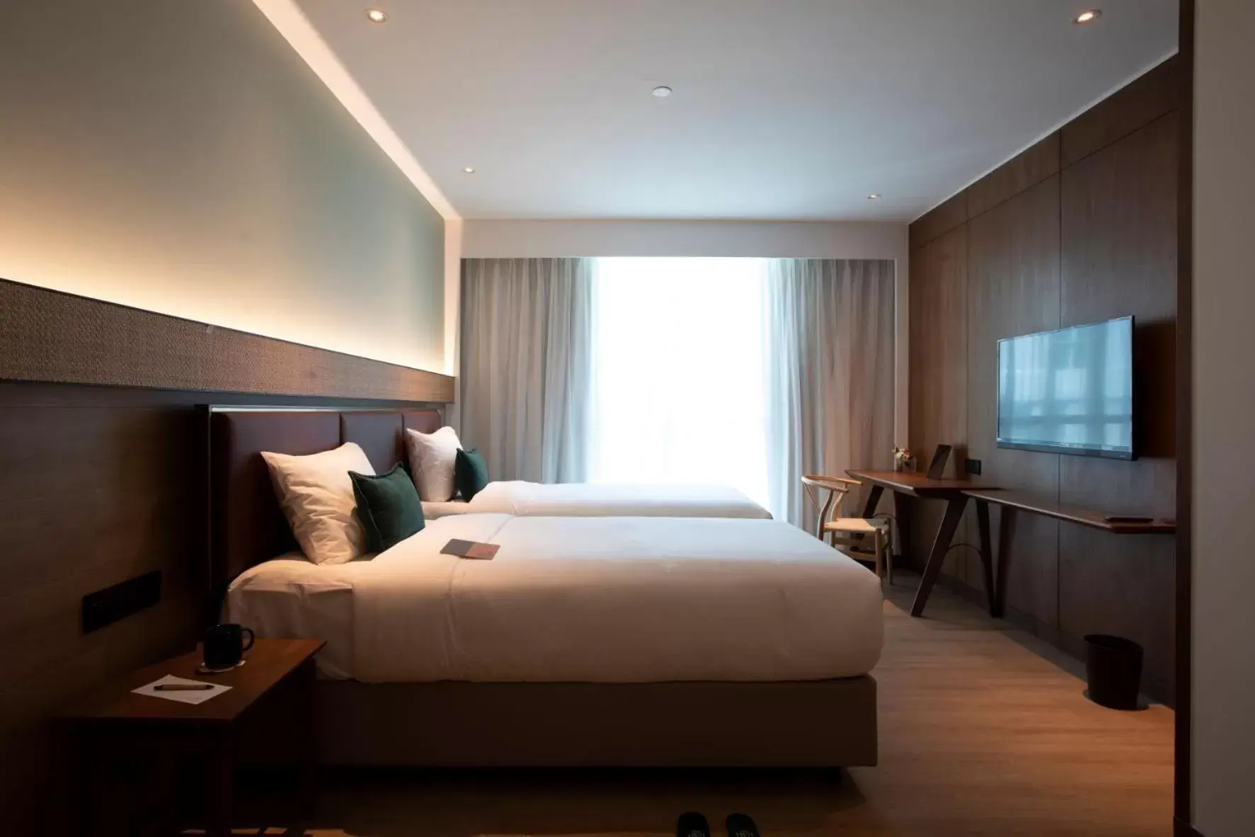 Bed in The LUMA Hotel, a Member of Design Hotels