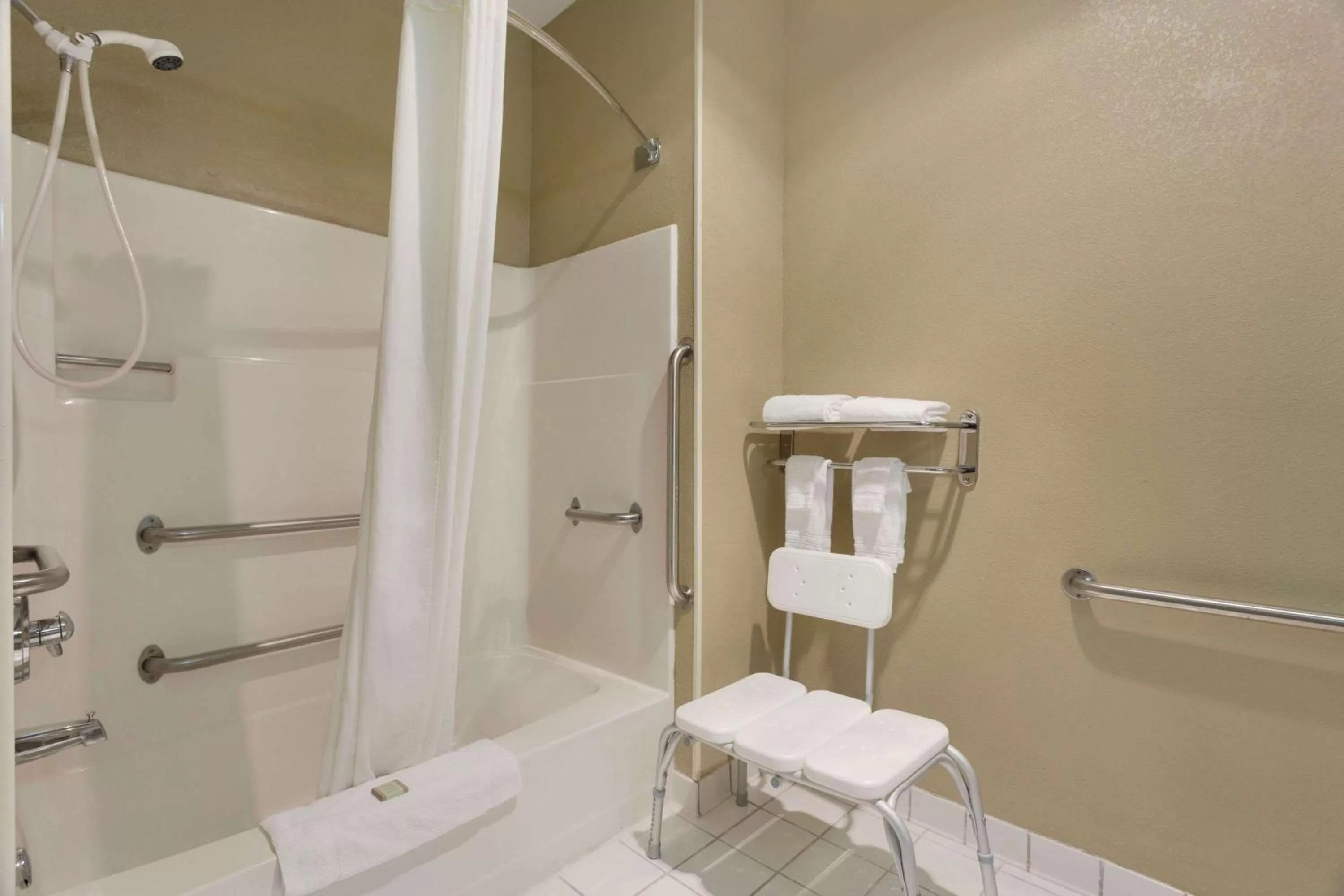 Bathroom in Super 8 by Wyndham Lees Summit