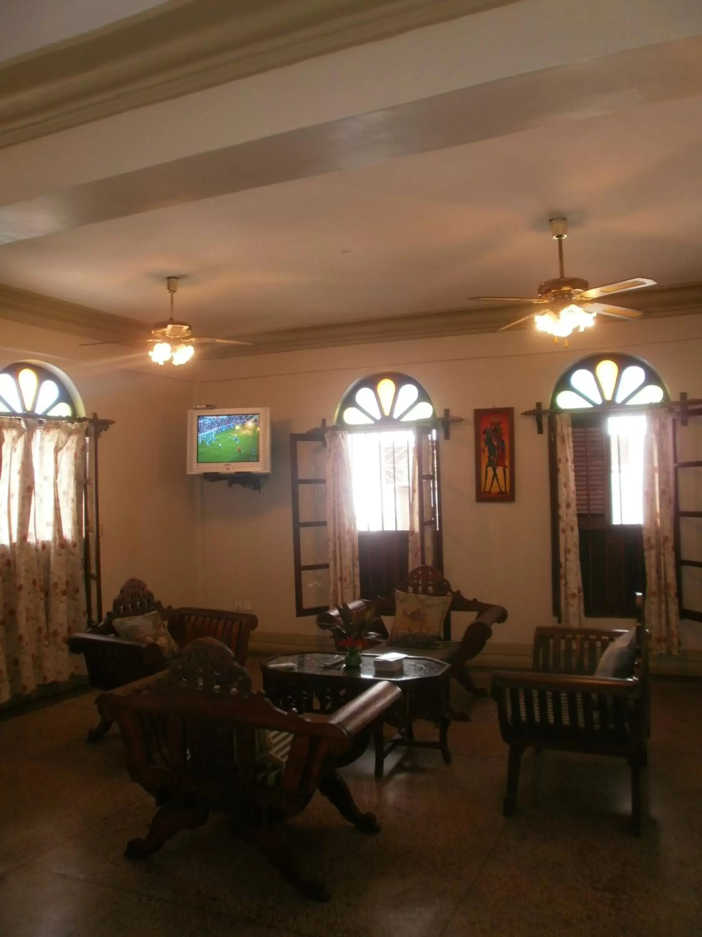 Communal lounge/ TV room, Seating Area in Asmini Palace Hotel