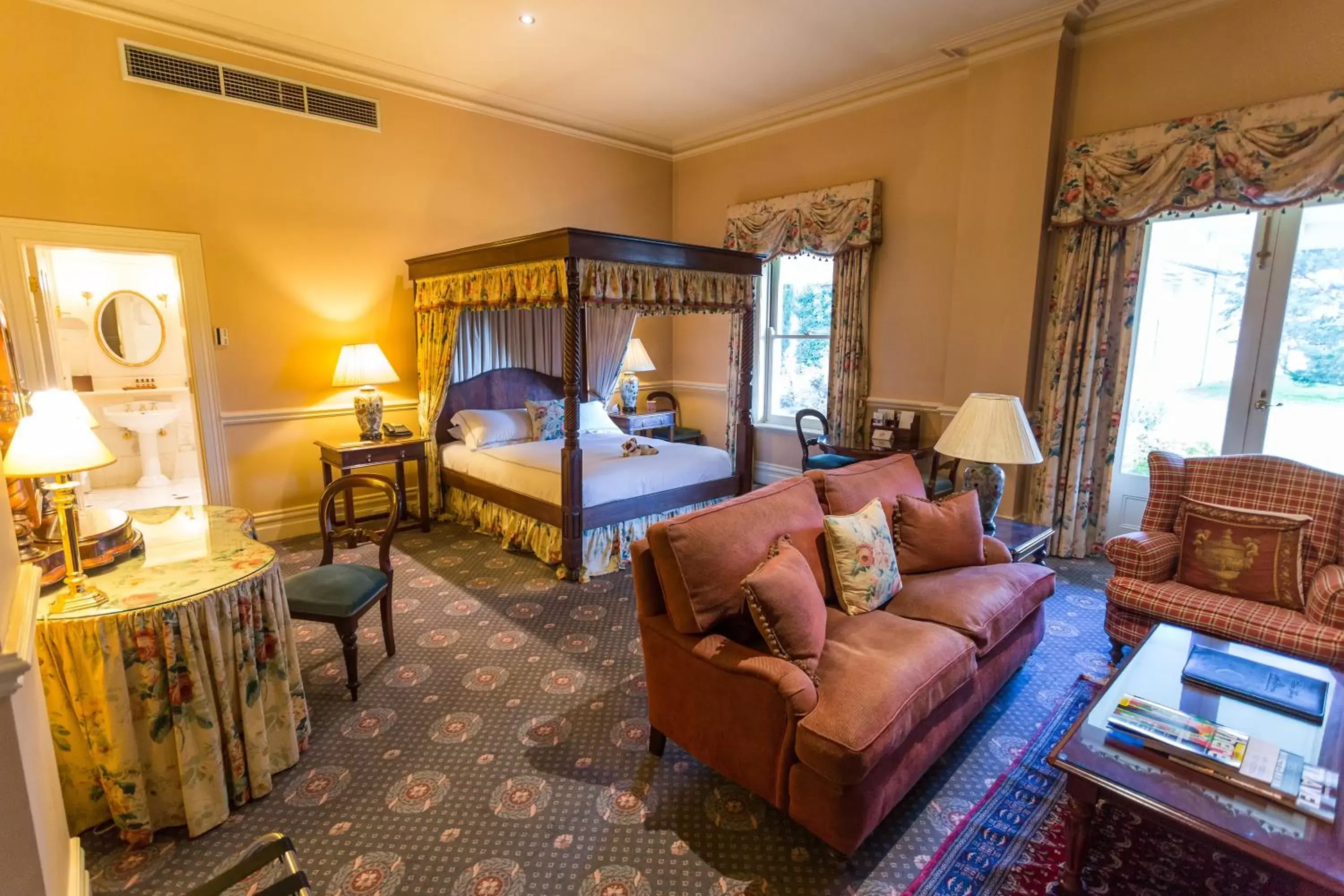 Bed, Seating Area in Chateau Yering Hotel